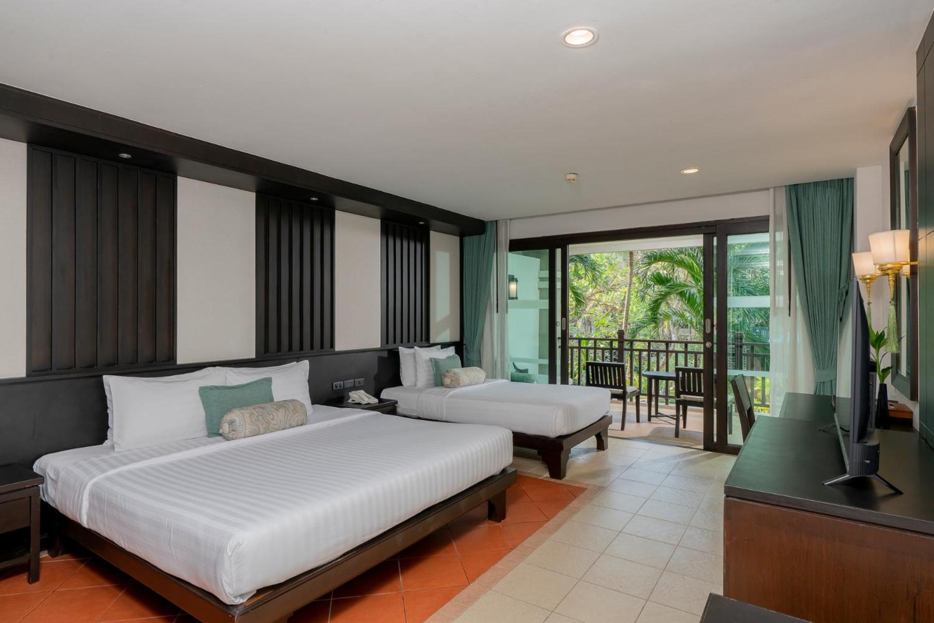 Deluxe Triple Room - Photo 13