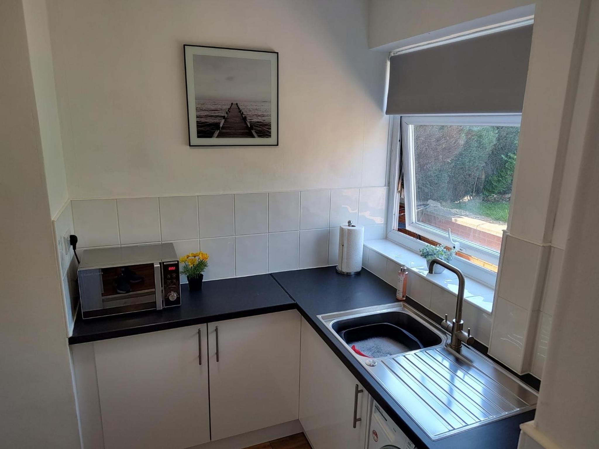 Three-Bedroom House photo 3