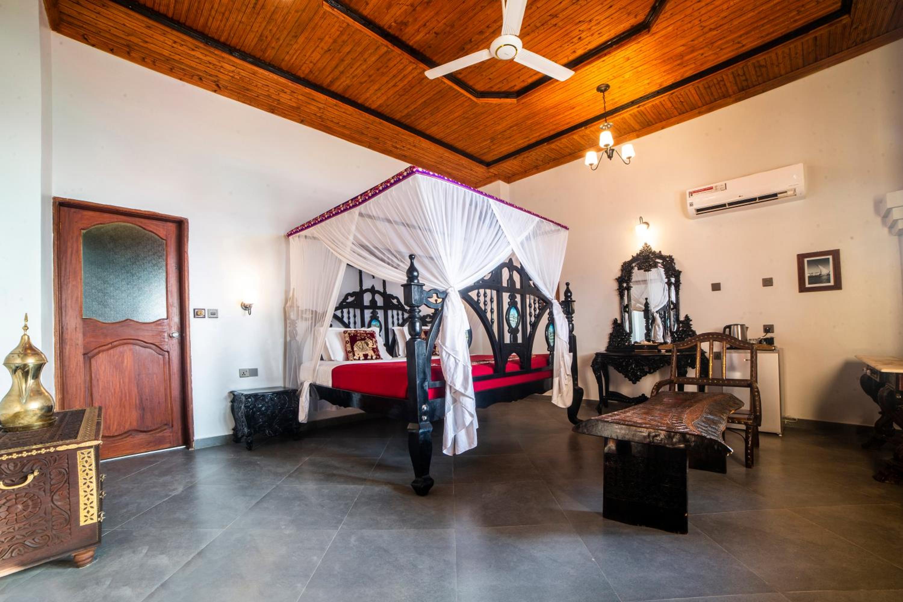 Deluxe Suite with Balcony & Beach View