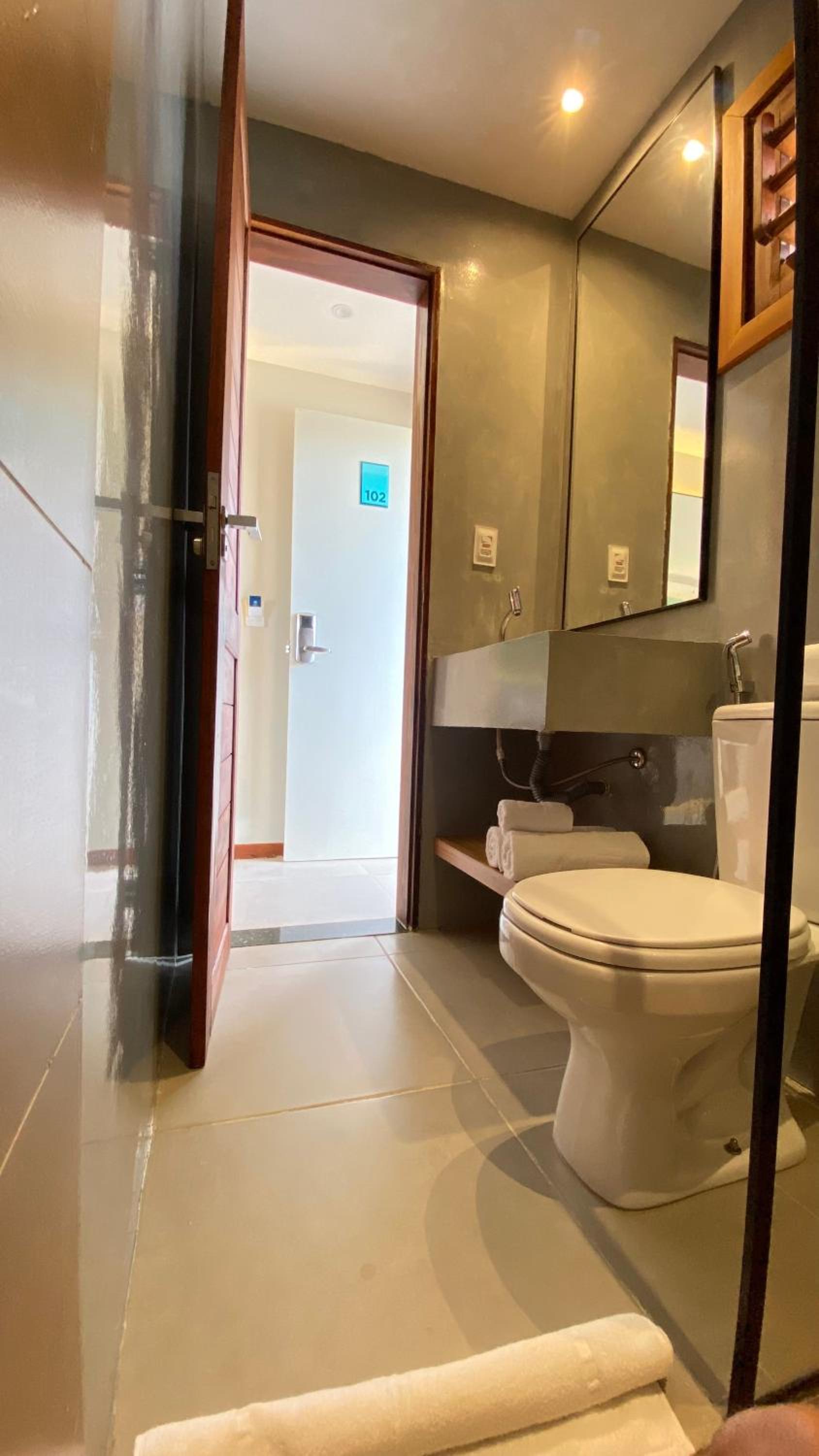 Deluxe Triple Room - Photo 11