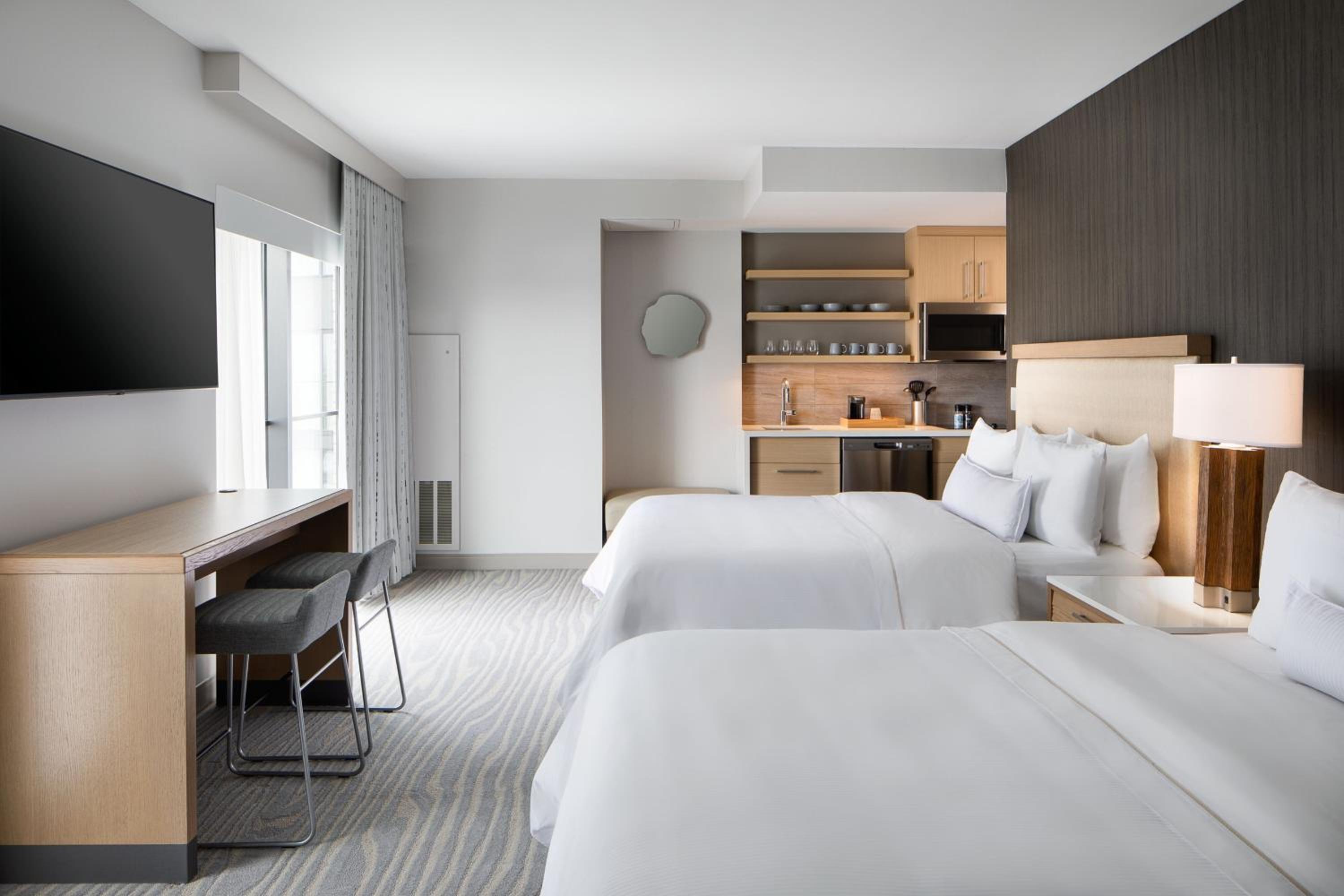 Standard Queen Room with Two Queen Beds and Kitchen - Hearing Accessible - Photo 1