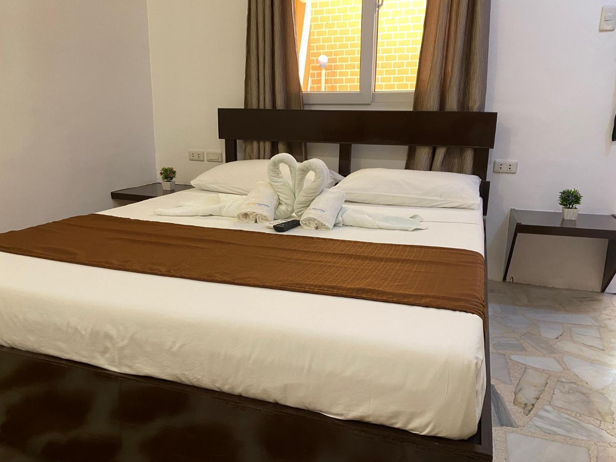 Deluxe Double Room with Balcony - Photo 15