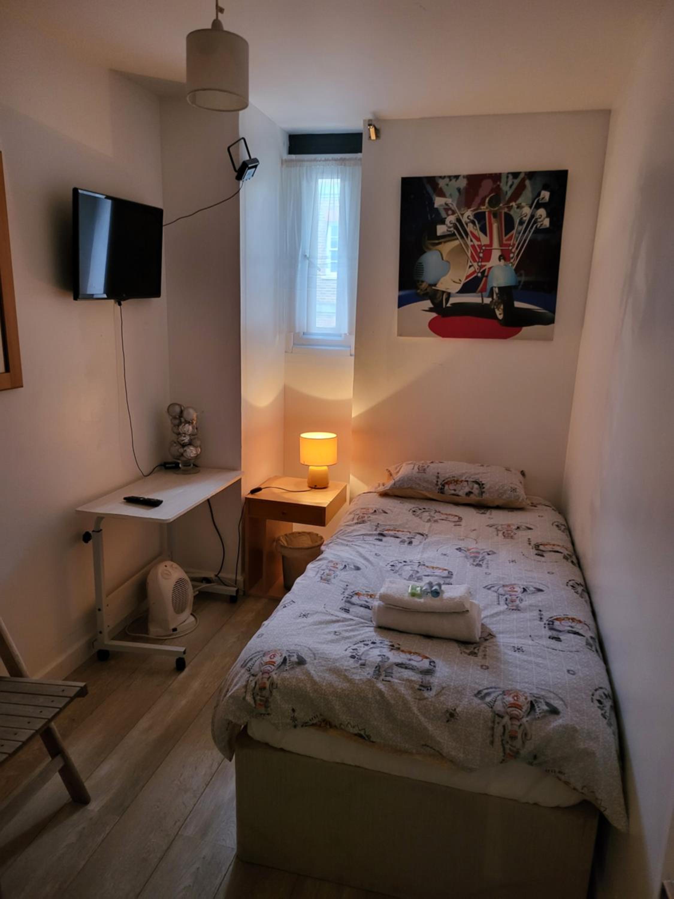 Three-Bedroom Apartment photo 2
