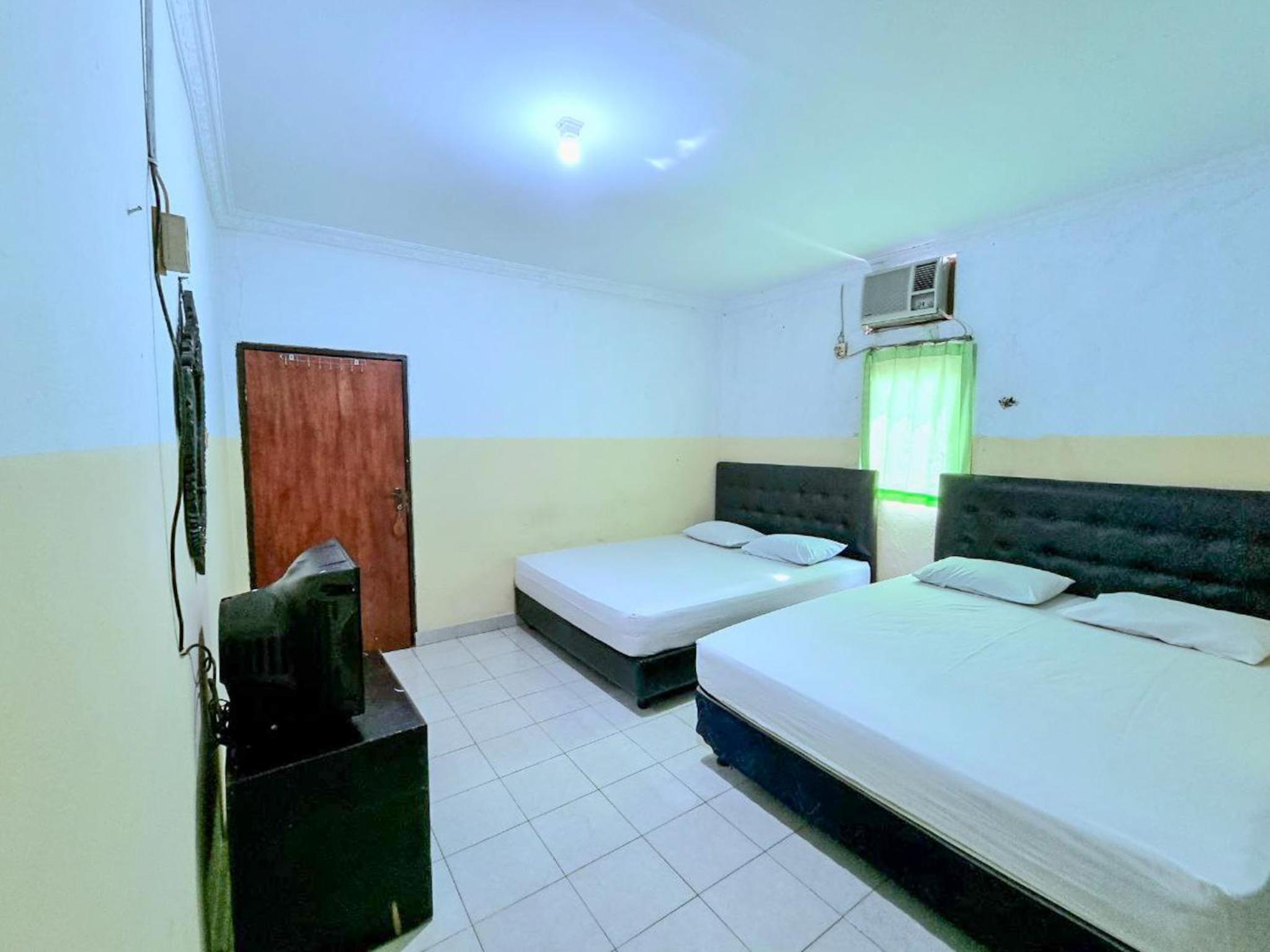 Deluxe Quadruple Room - Photo 6