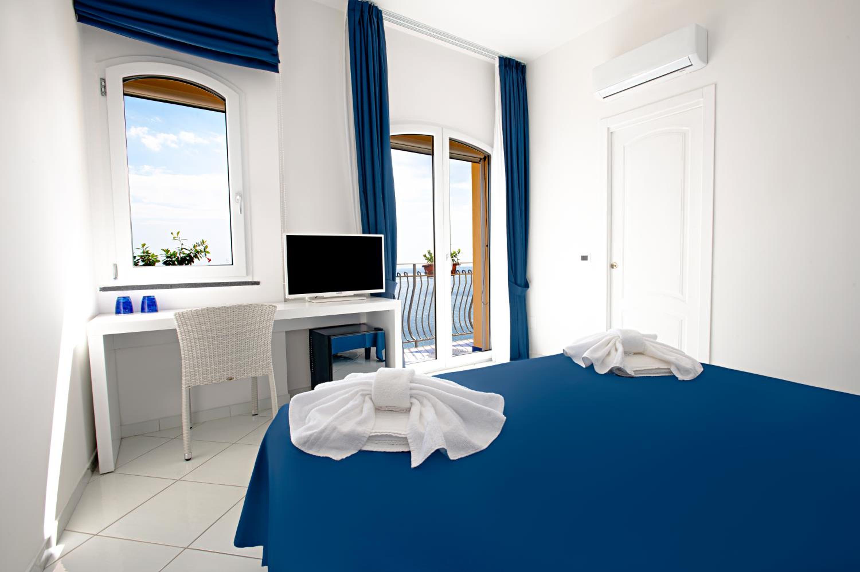 Deluxe Doppel- oder Zweibettzimmer mit Balkon