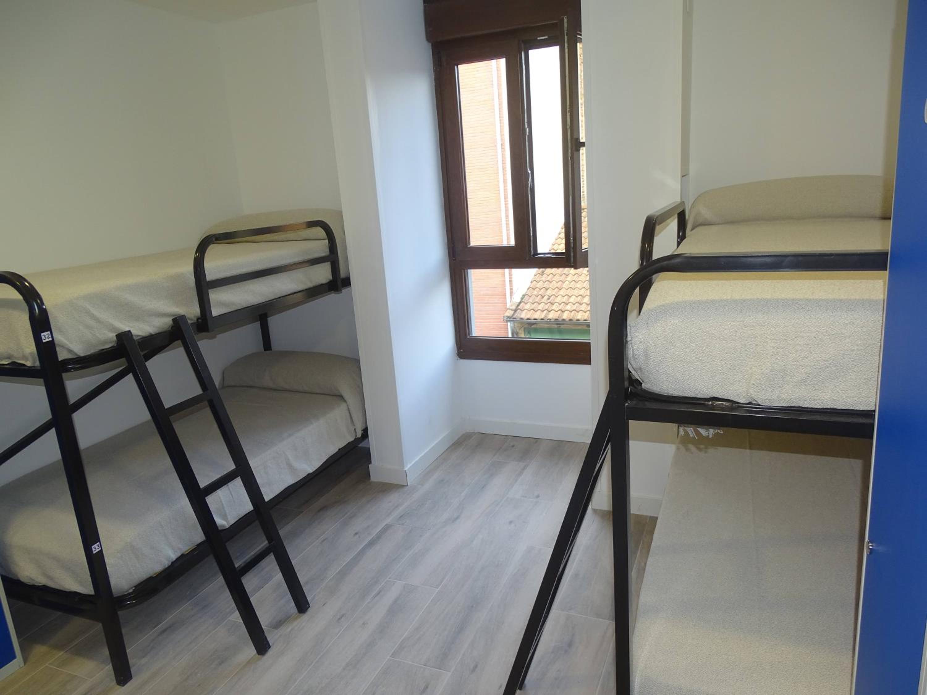 Quadruple Room with Private External Bathroom - Photo 1
