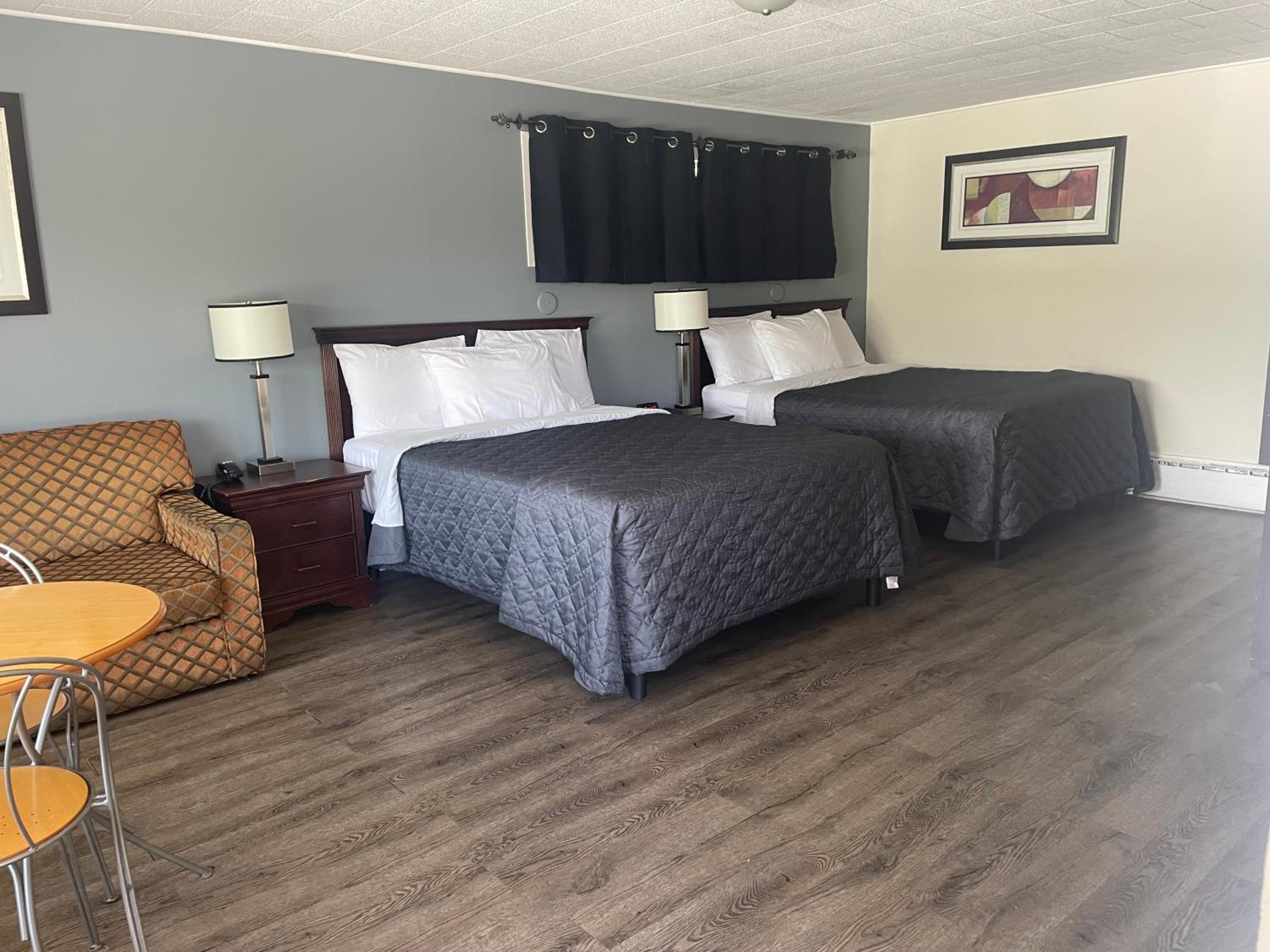 Deluxe Triple Room - Photo 1