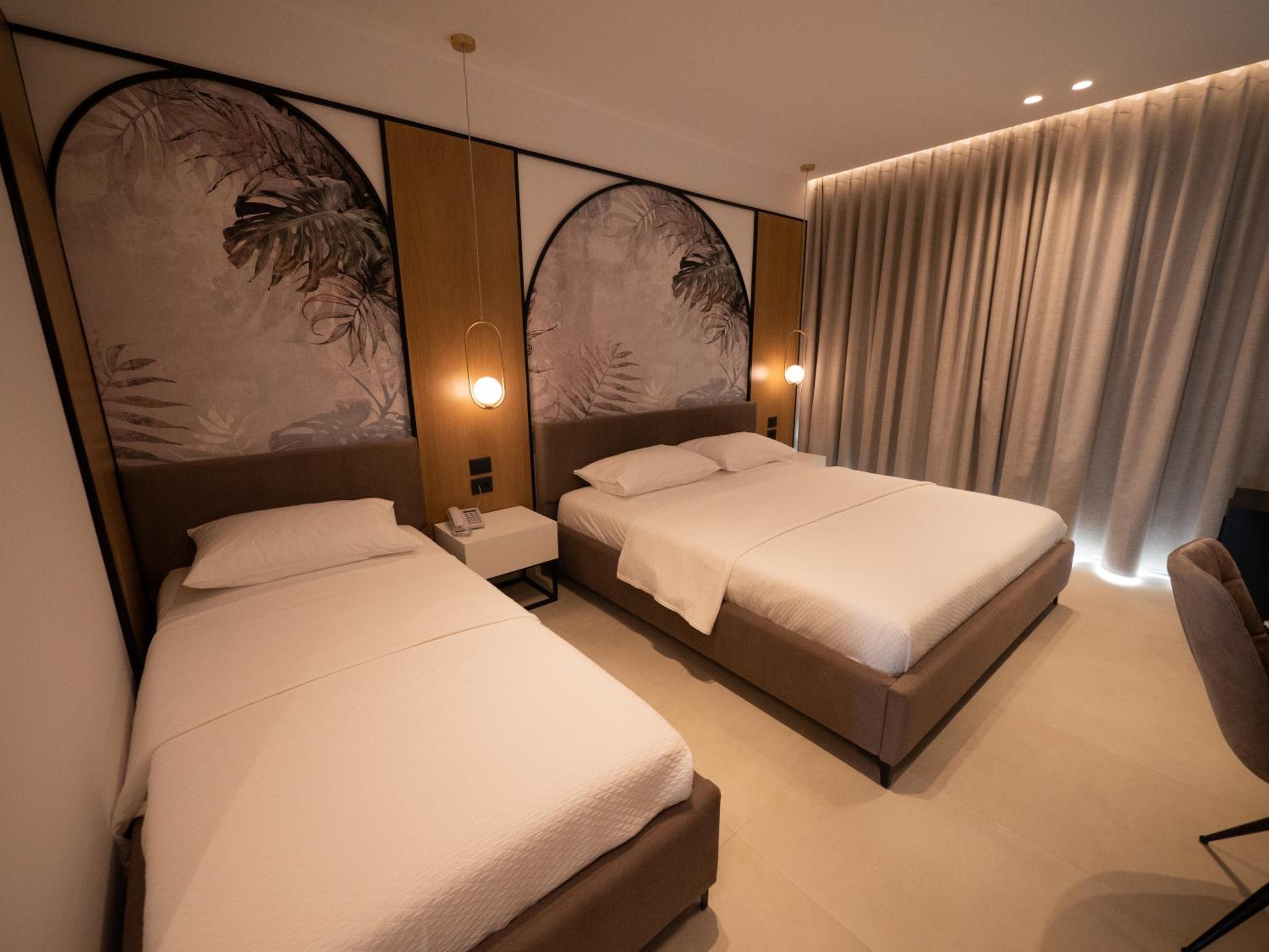 Deluxe Triple Room with Balcony photo 3