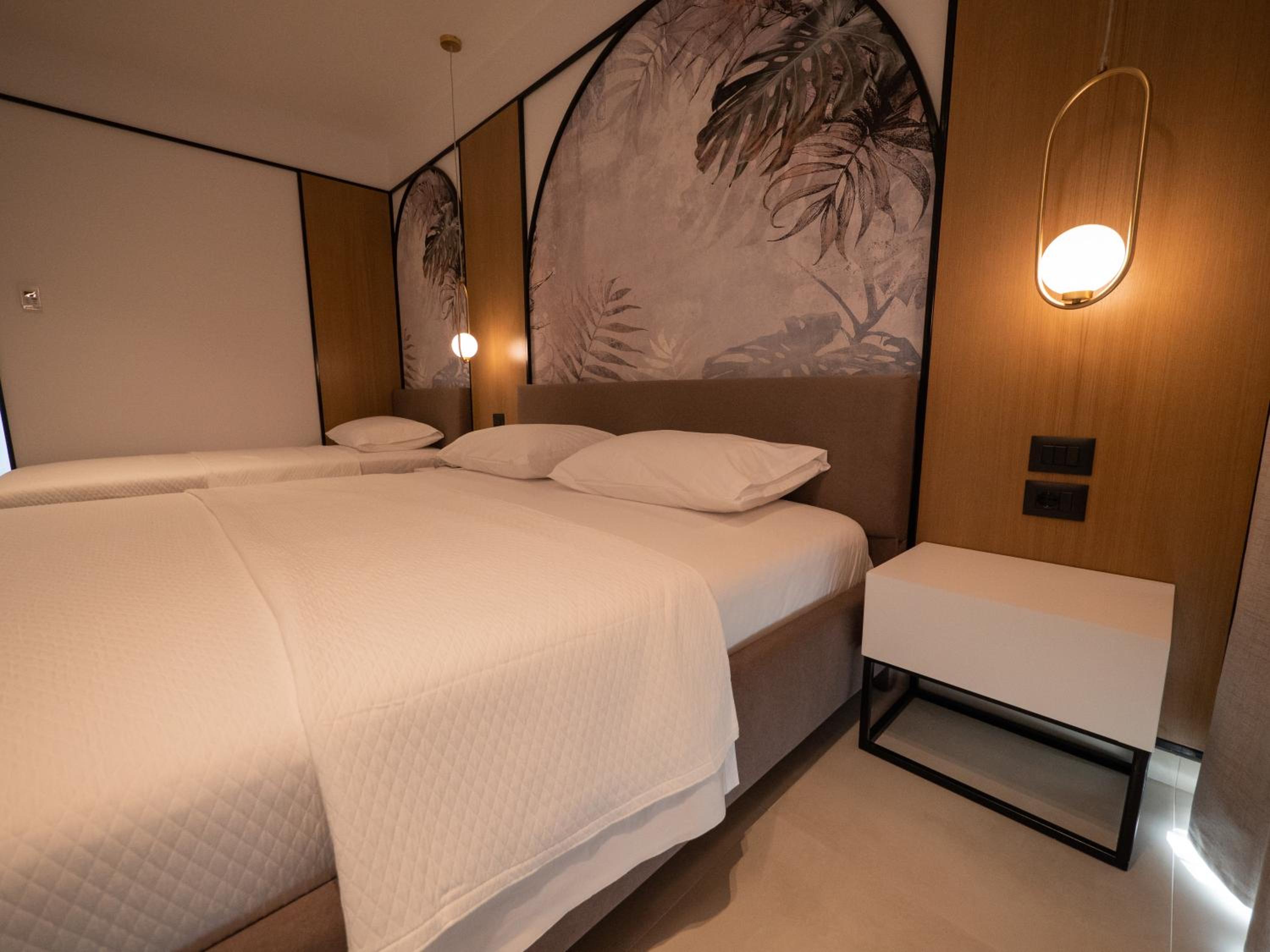 Deluxe Triple Room with Balcony photo 2