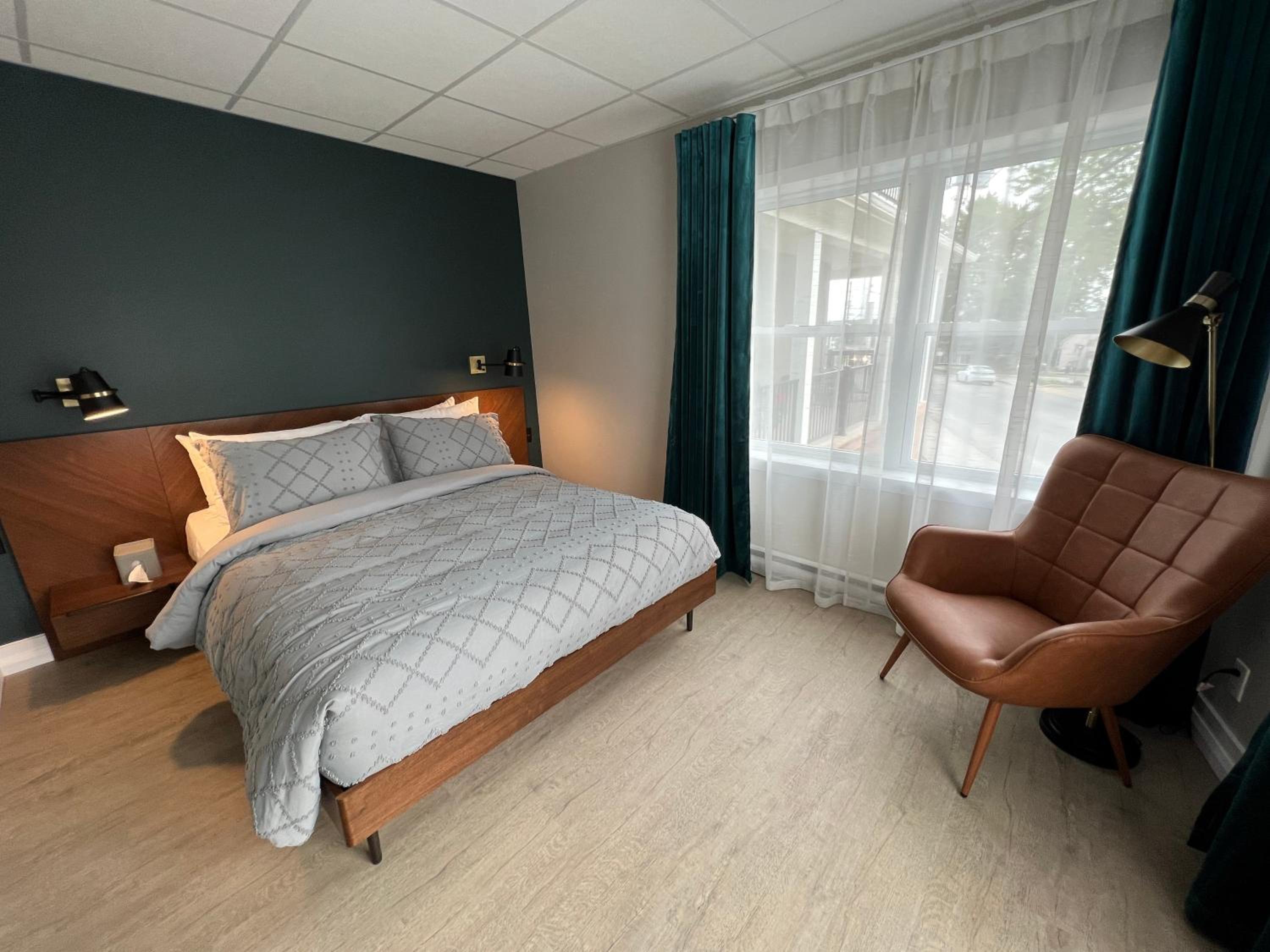 Standard Queen Room with Two Queen Beds - Photo 1