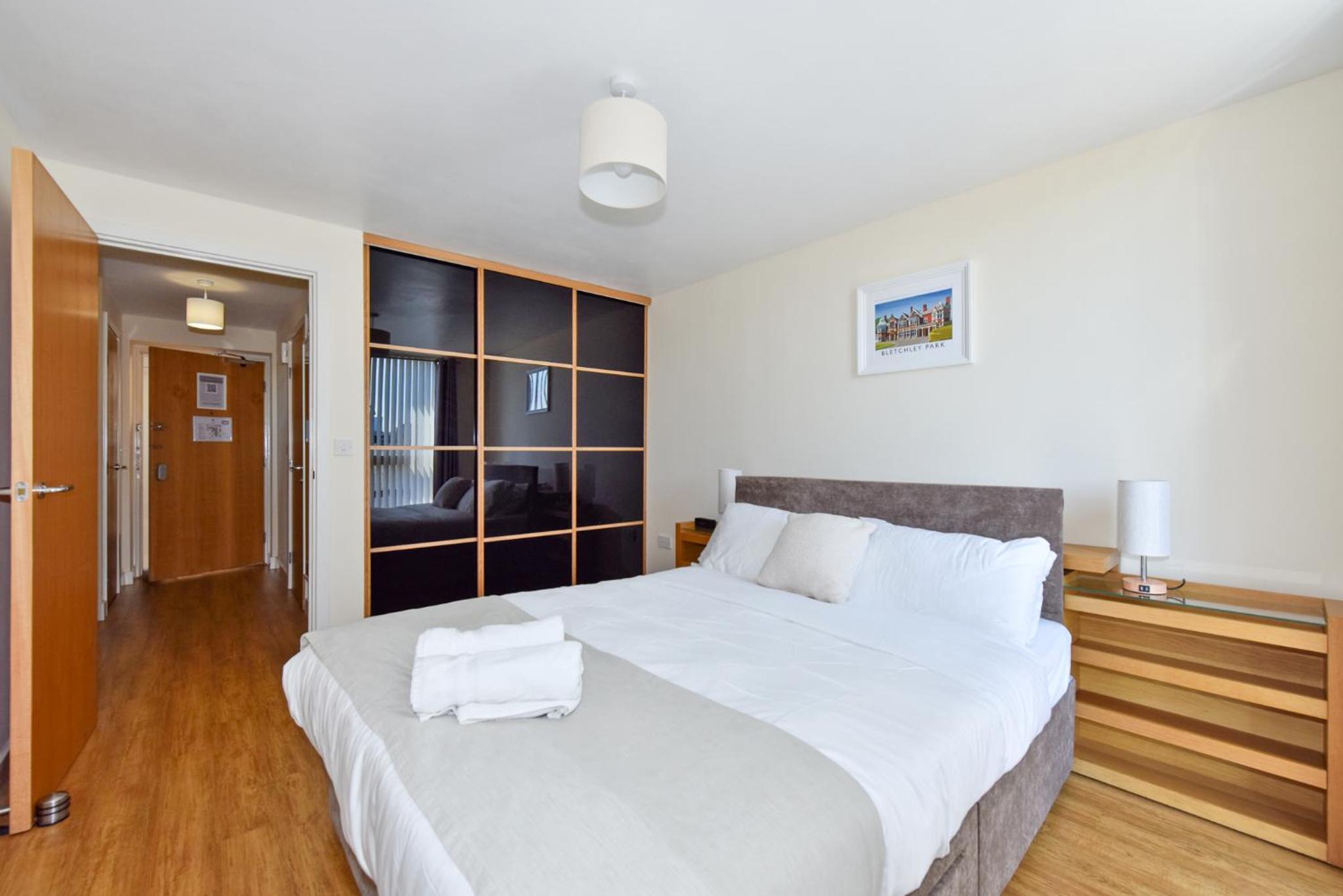 One-Bedroom Apartment with Balcony and City View