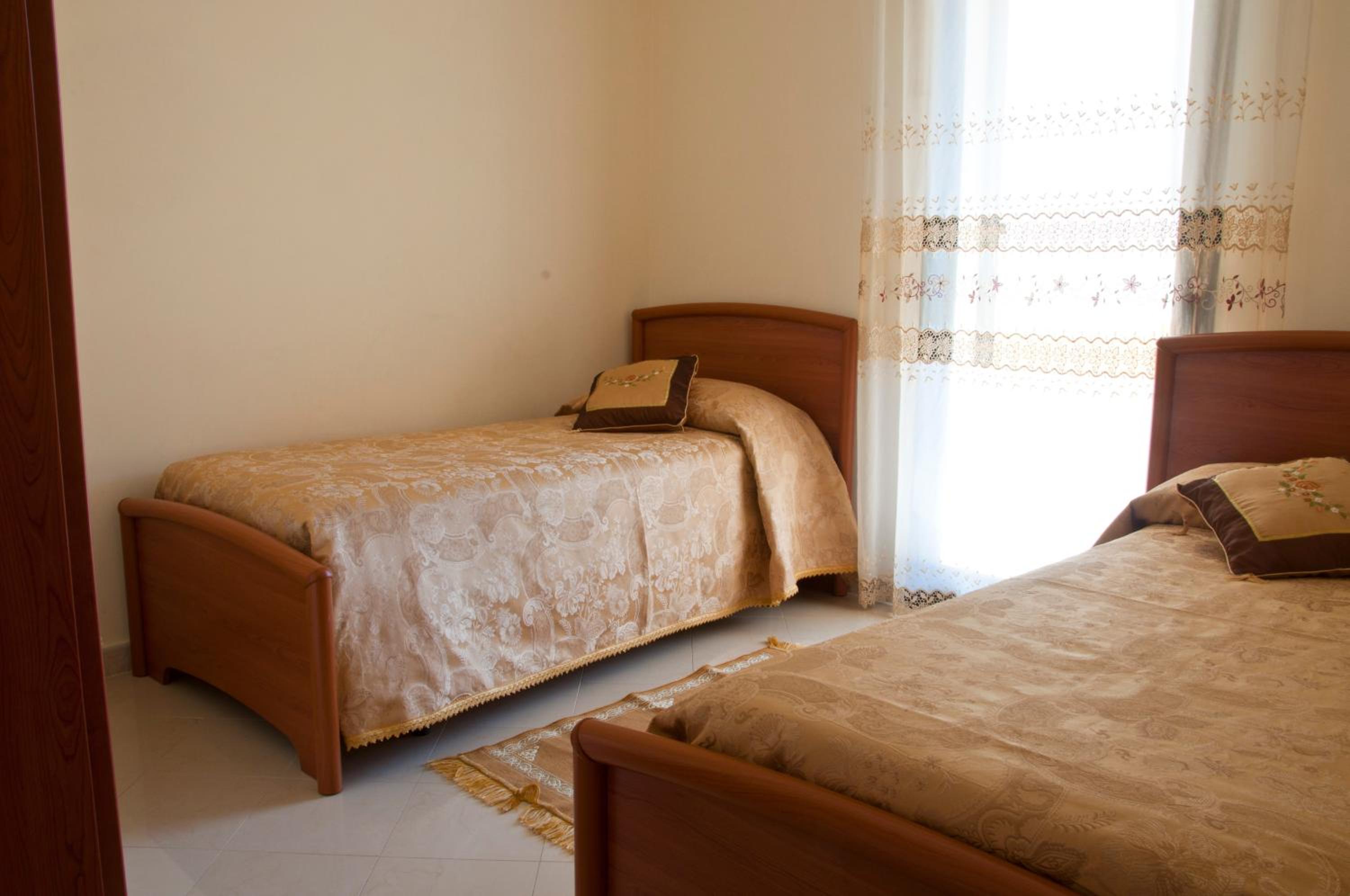 Three-Bedroom Apartment - Photo 12