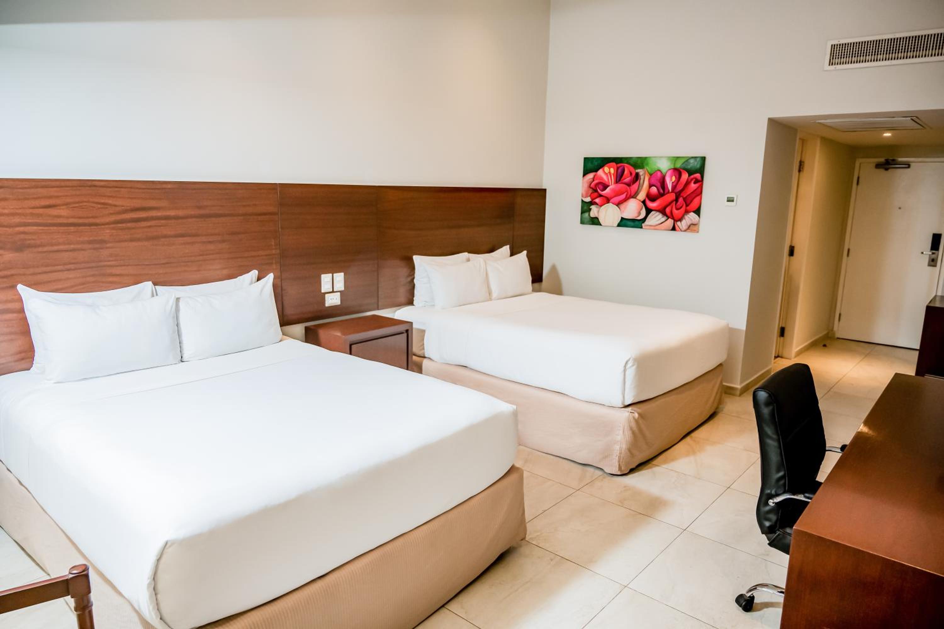 Executive Queen Room with Two Queen Beds, Balcony and Garden View