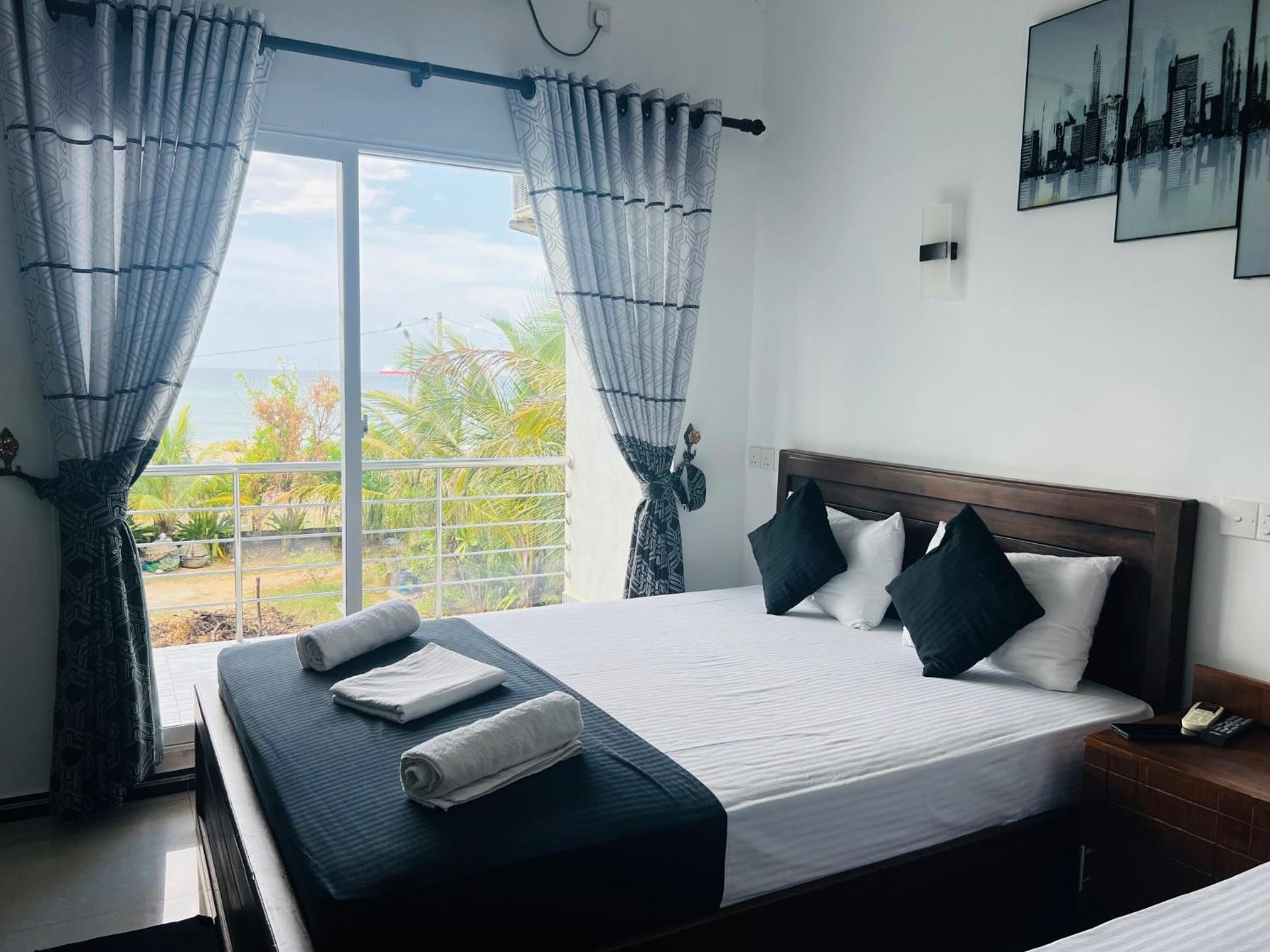 Deluxe Triple Room with Sea View
