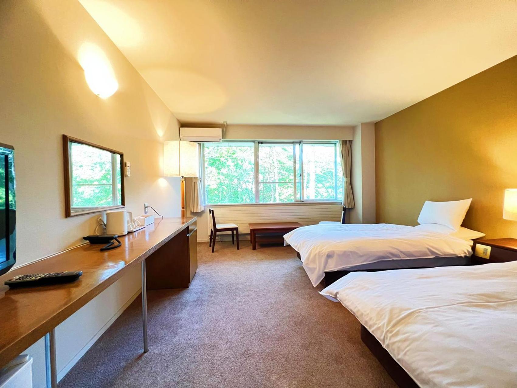 Standard Twin Room - Photo 3