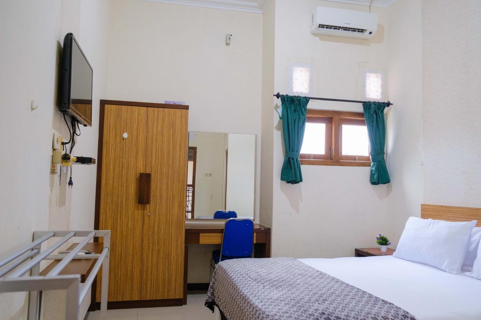 Deluxe Room - Photo 5