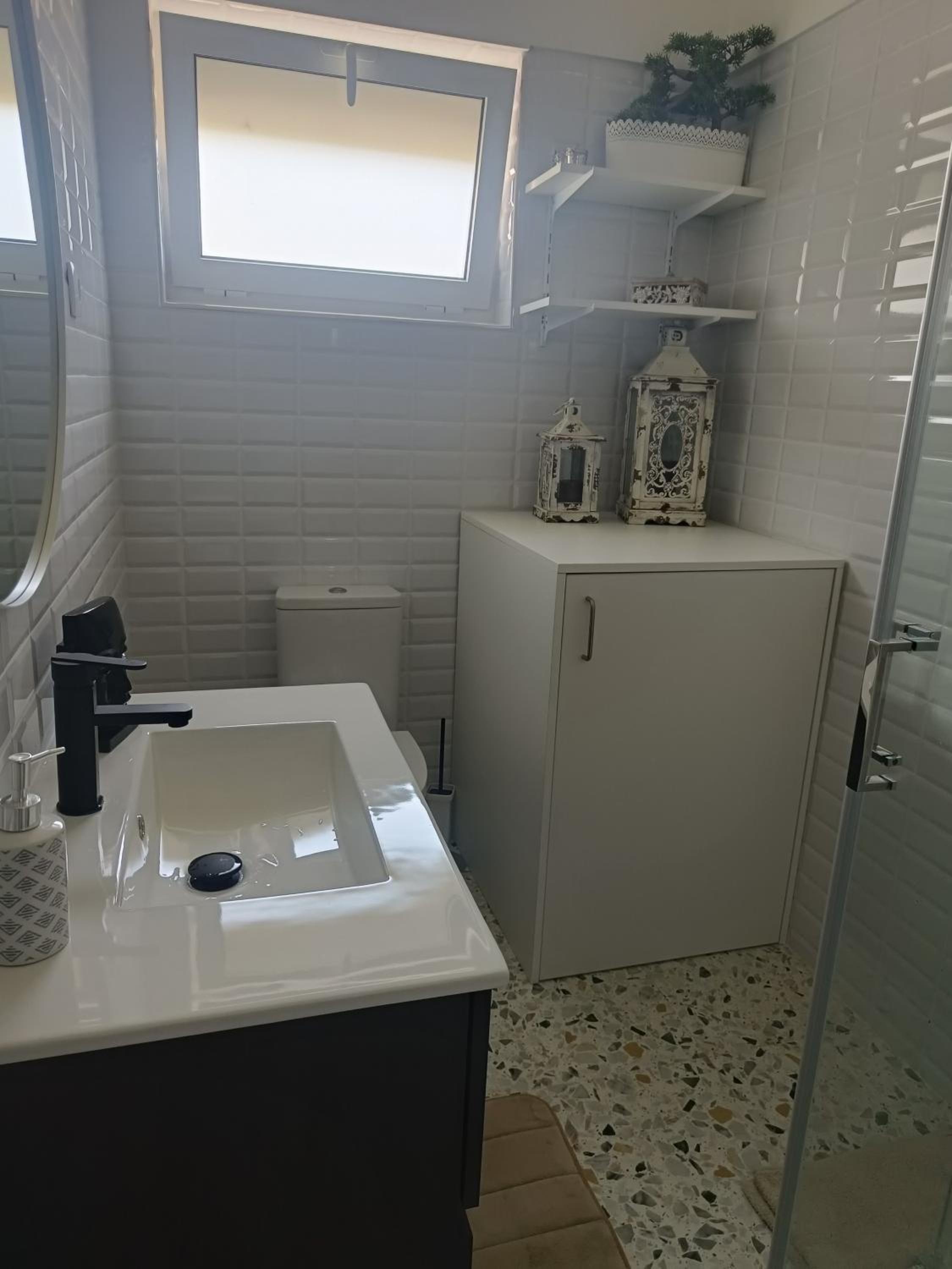Three-Bedroom House - Photo 25
