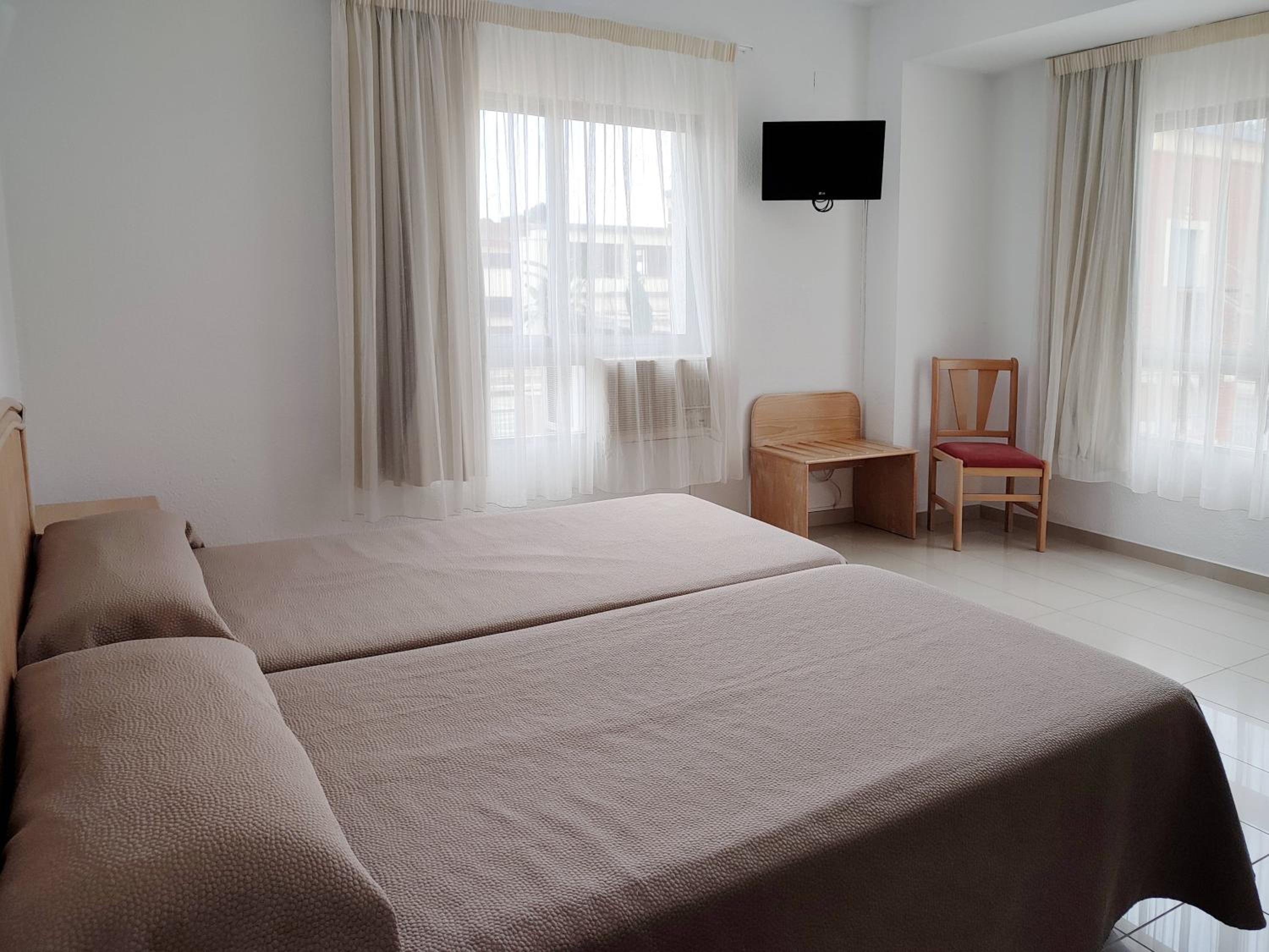 Habitación Doble Deluxe (2 Adultos + 1 Niño)