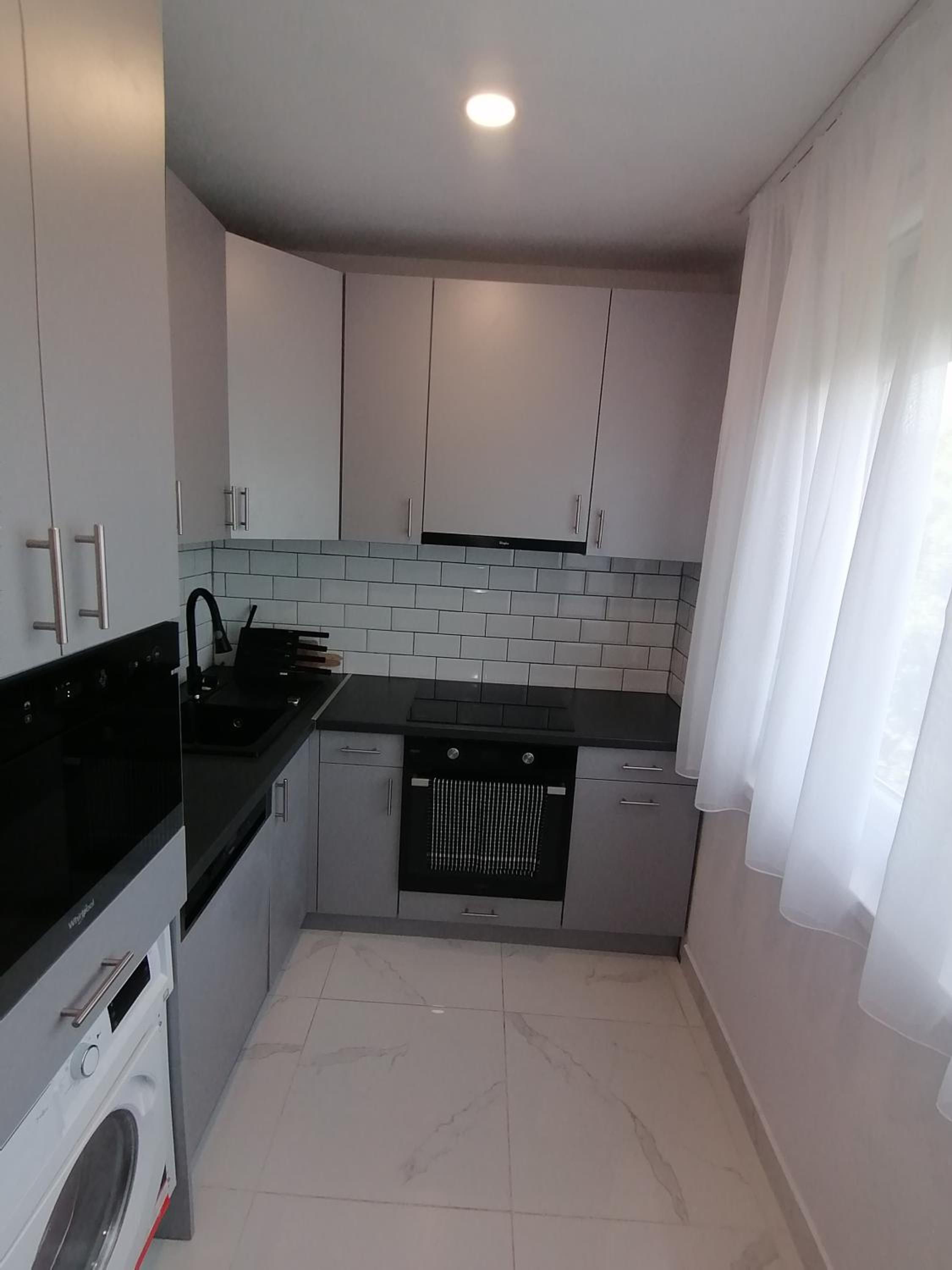 Three-Bedroom Apartment - Photo 7