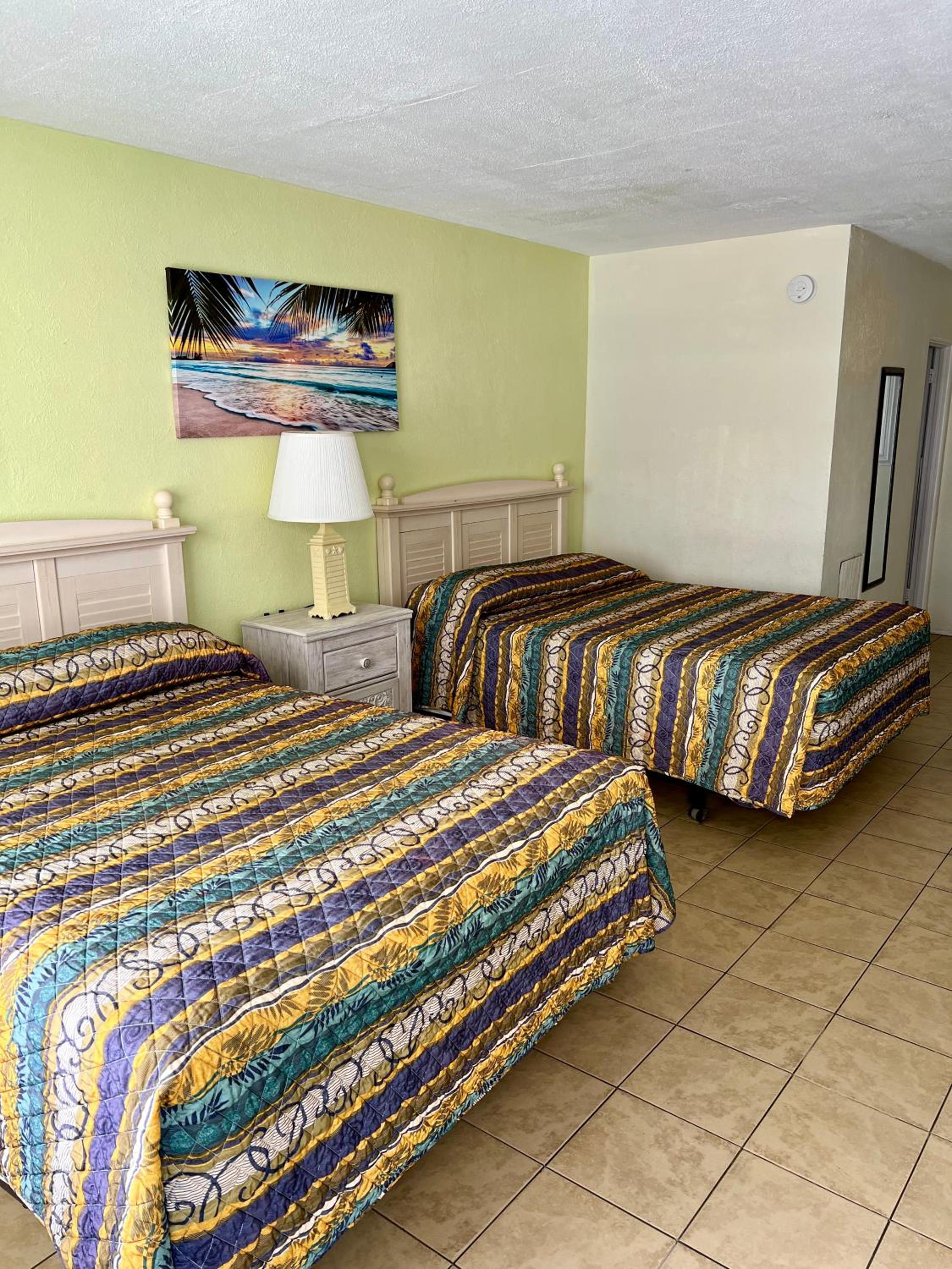 Deluxe Room with Two Queen Beds and Balcony and Sea View photo 1