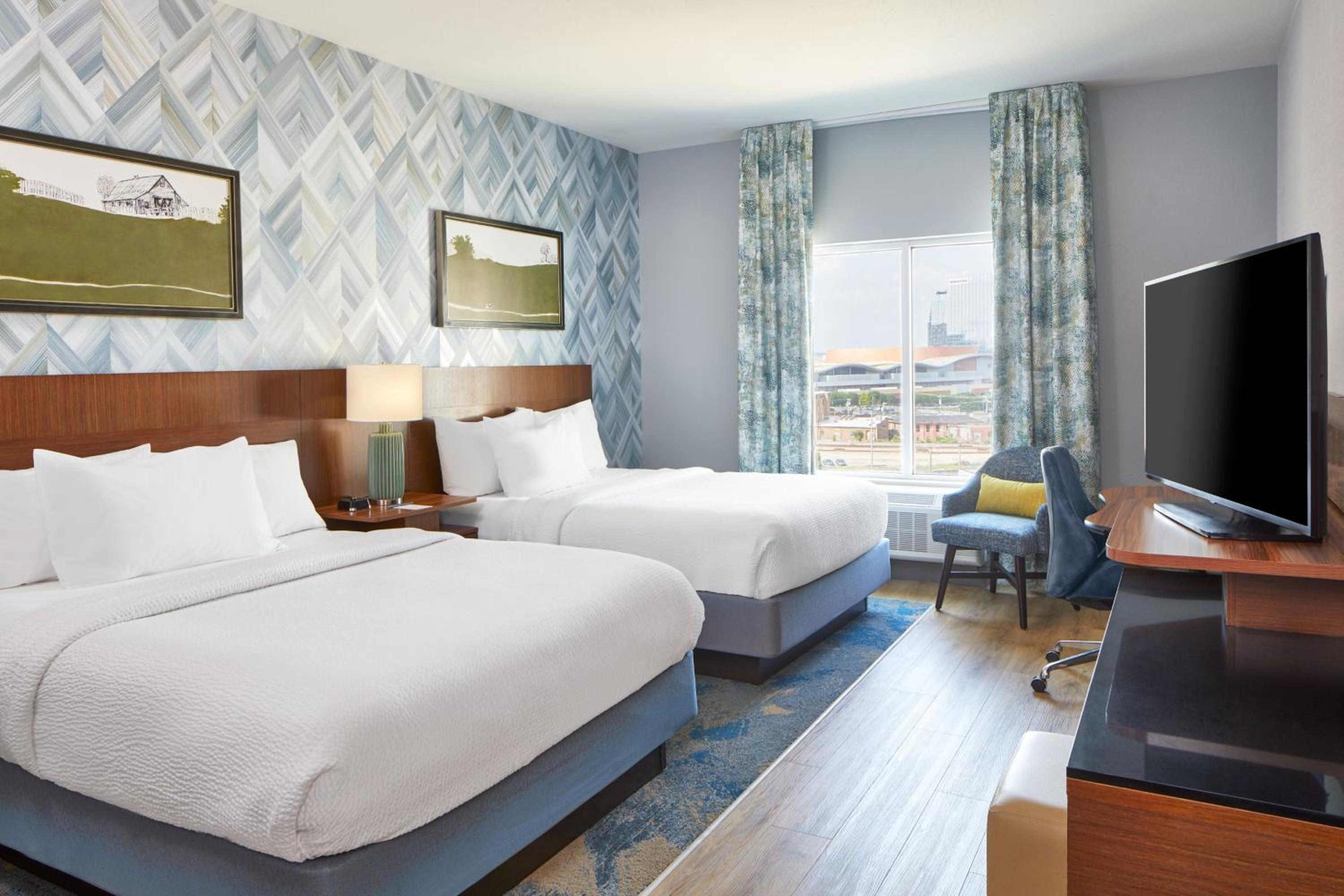 Queen Room with Two Queen Beds - Hearing Accessible photo 1