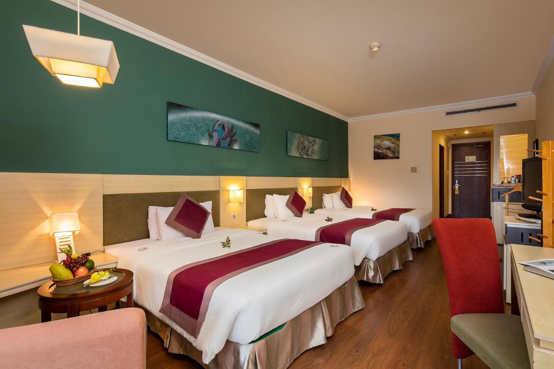 Deluxe Triple Room - Photo 1