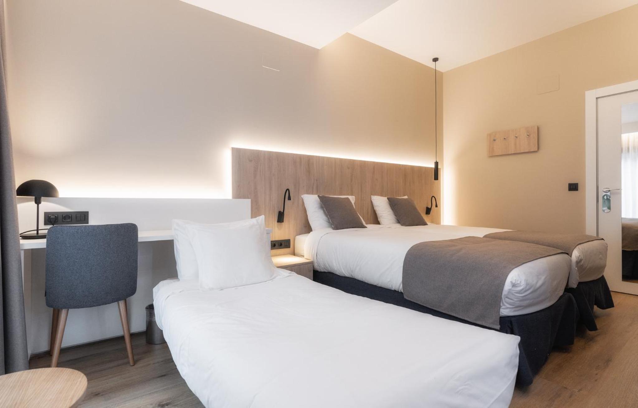Habitación Doble con Cama Supletoria Habitación Doble con Cama Supletoria