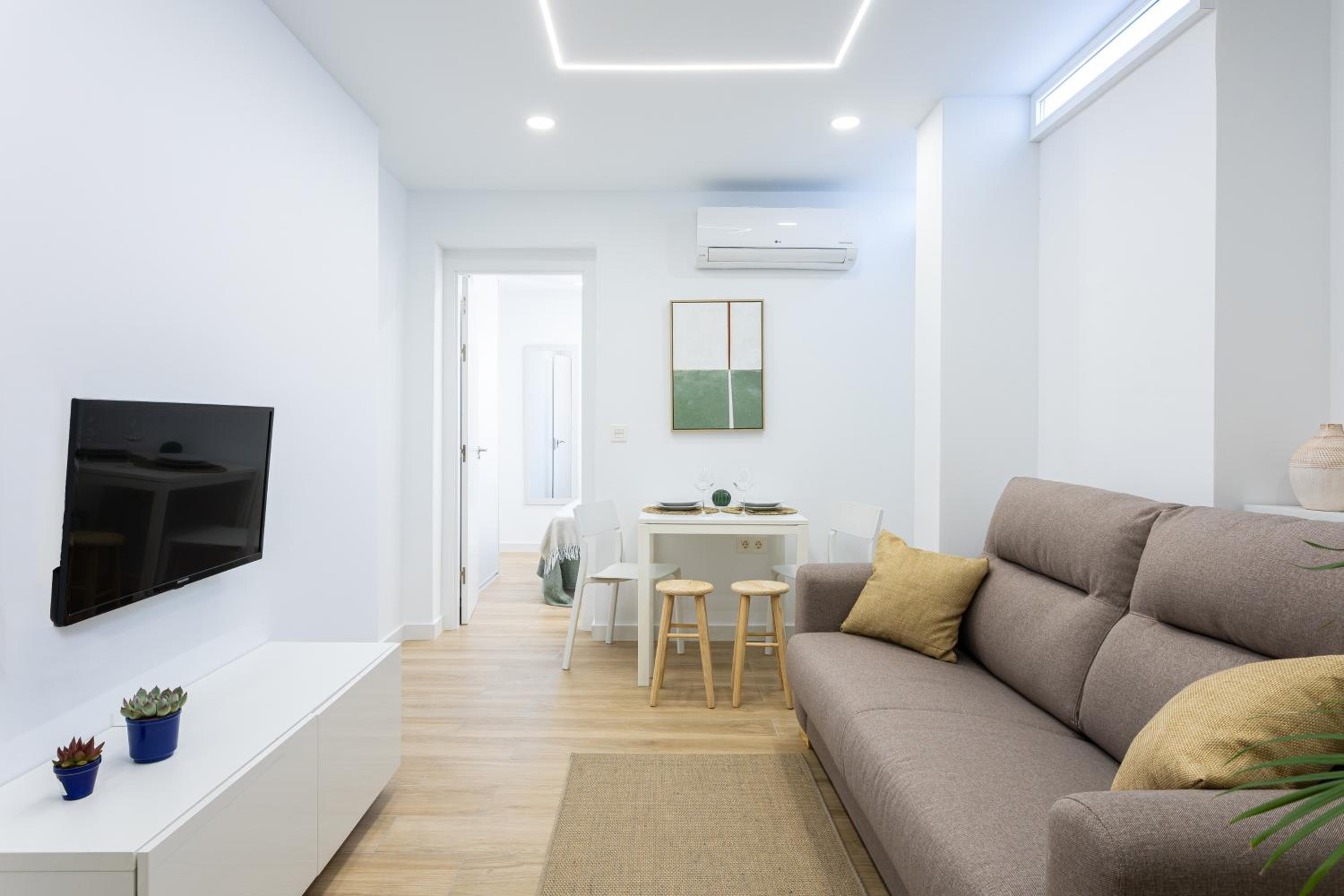 Apartamento de una habitación con terraza compartida.