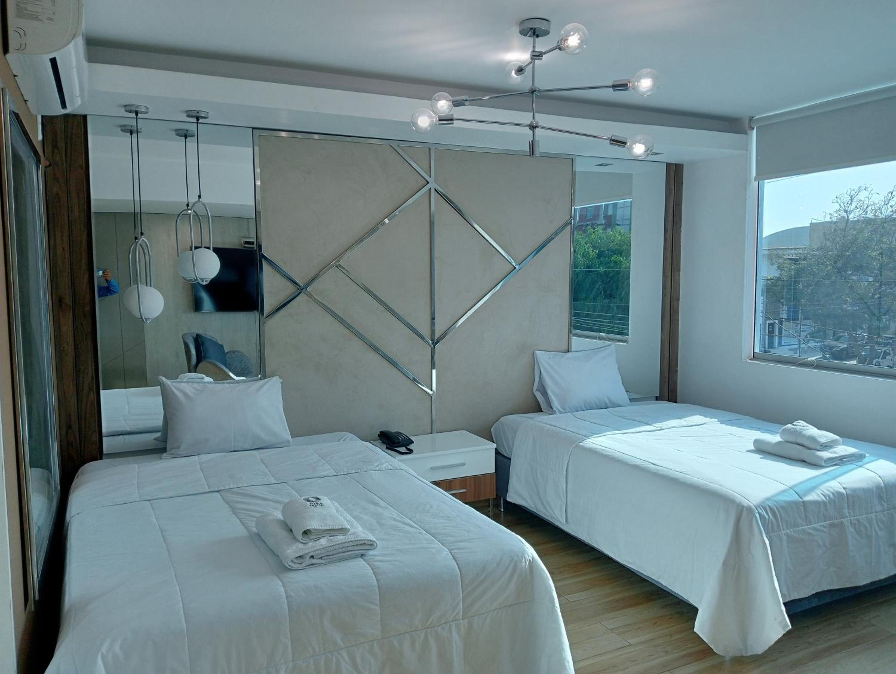 Deluxe Queen Room with Two Queen Beds photo 3