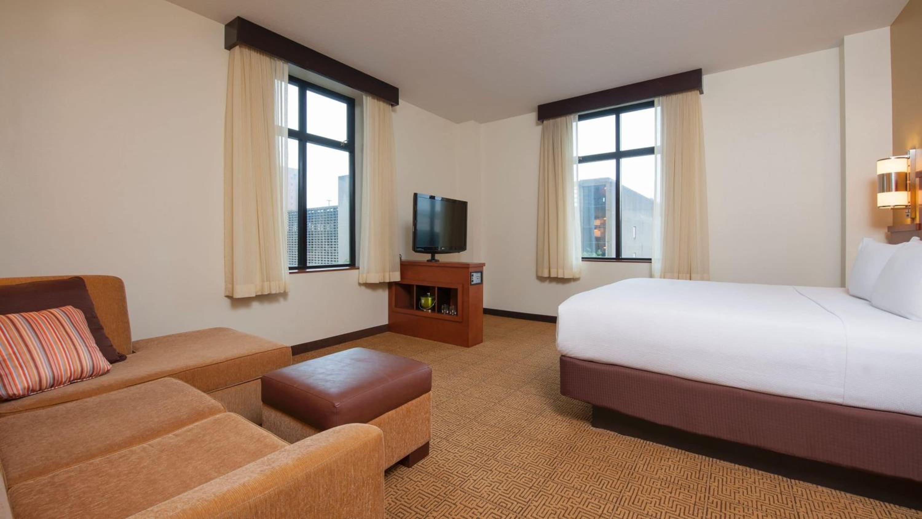 Corner Specialty King Room with Sofa Bed - Photo 1