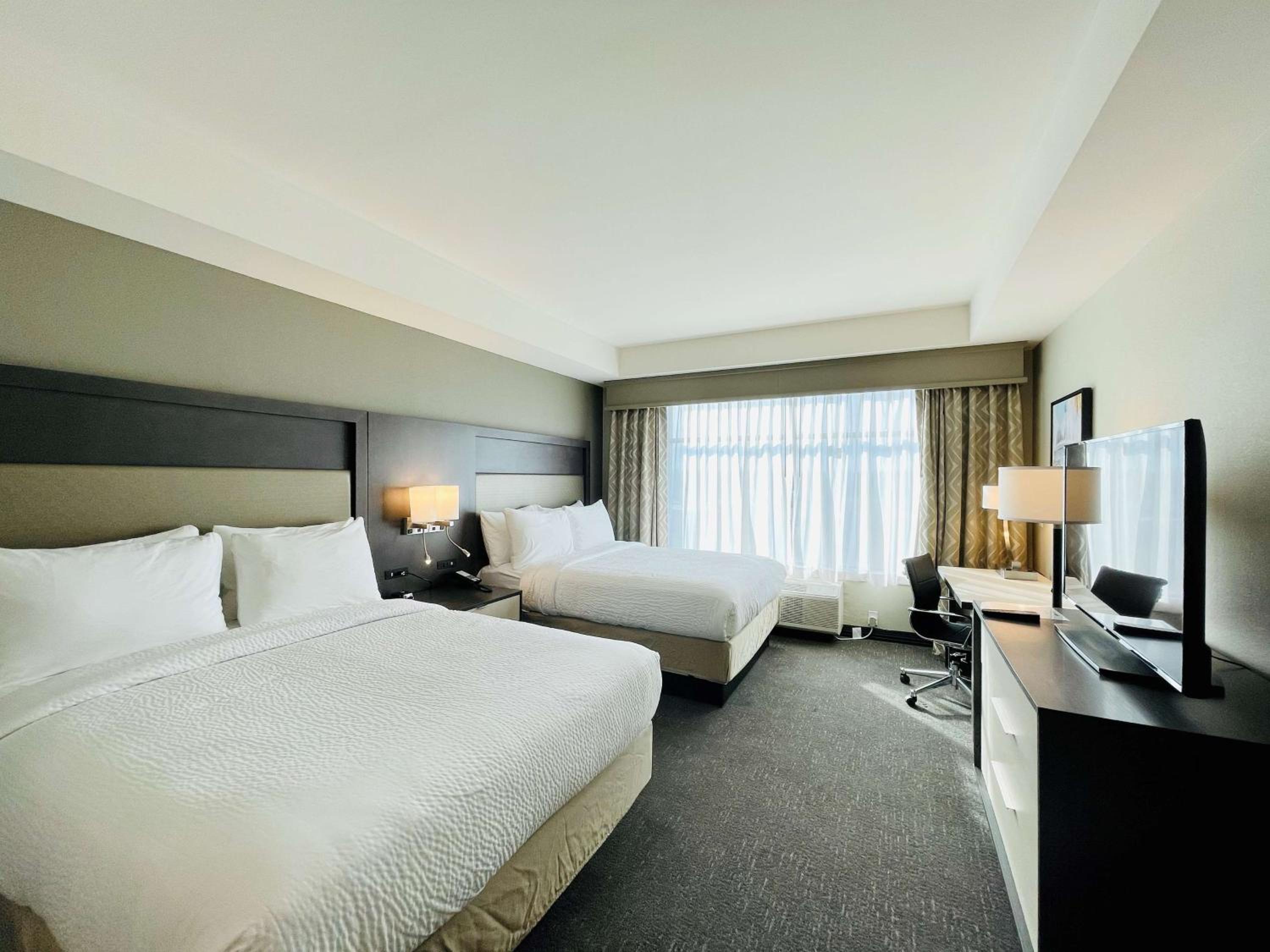 Queen Room with Two Queen Beds - Photo 1