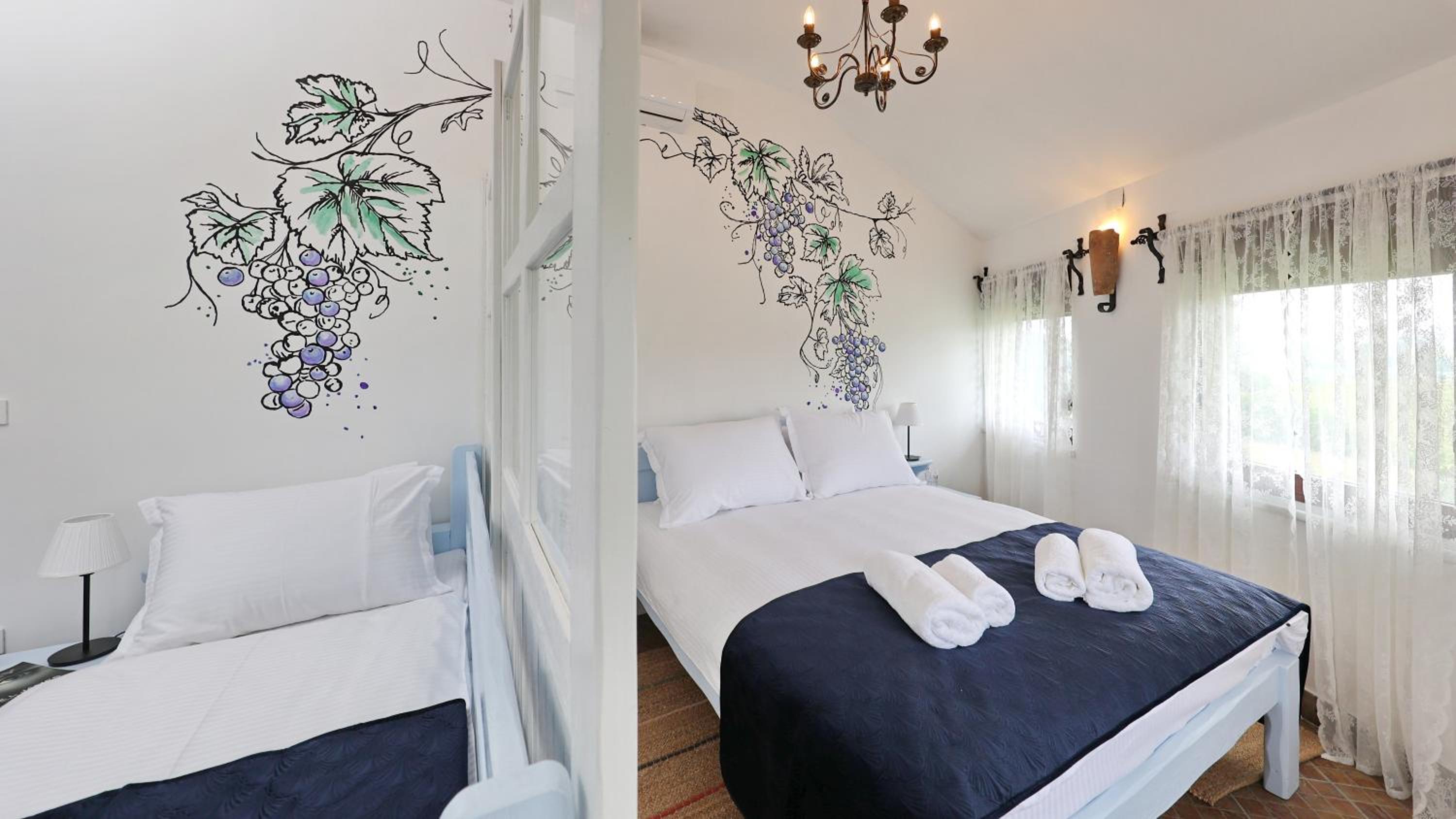Deluxe Quadruple Room - Photo 13