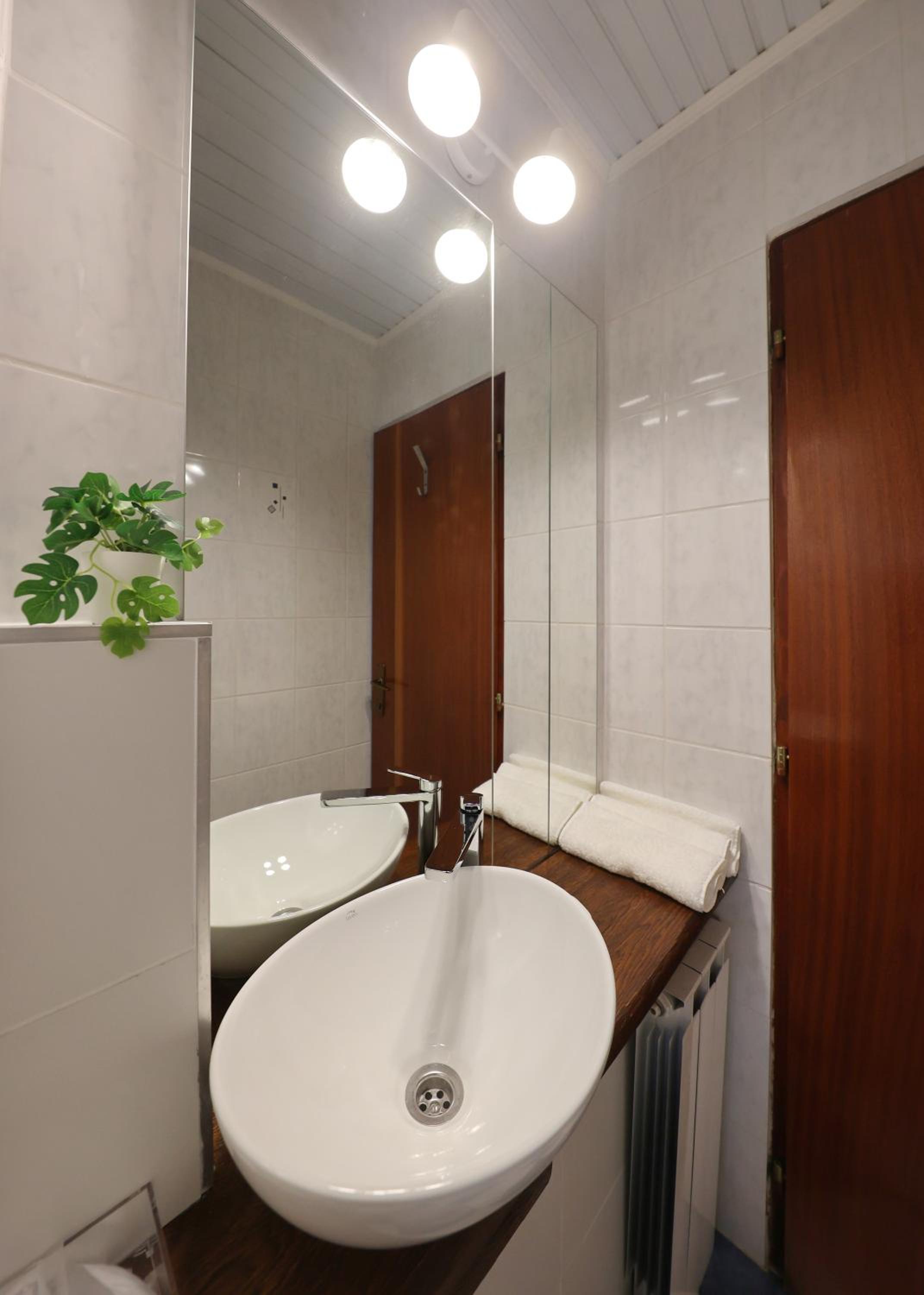 Deluxe Quadruple Room - Photo 18