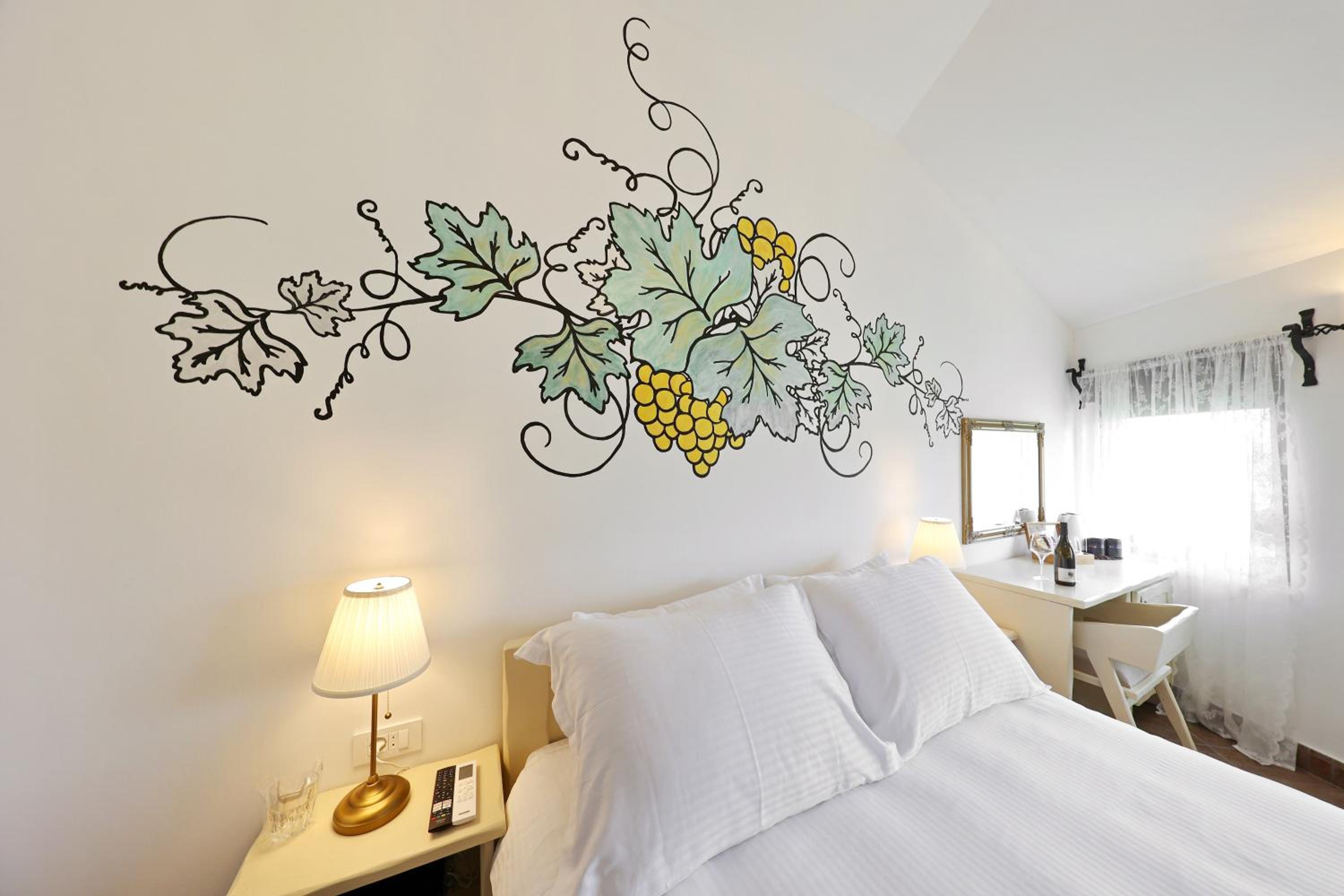 Deluxe Quadruple Room - Photo 21