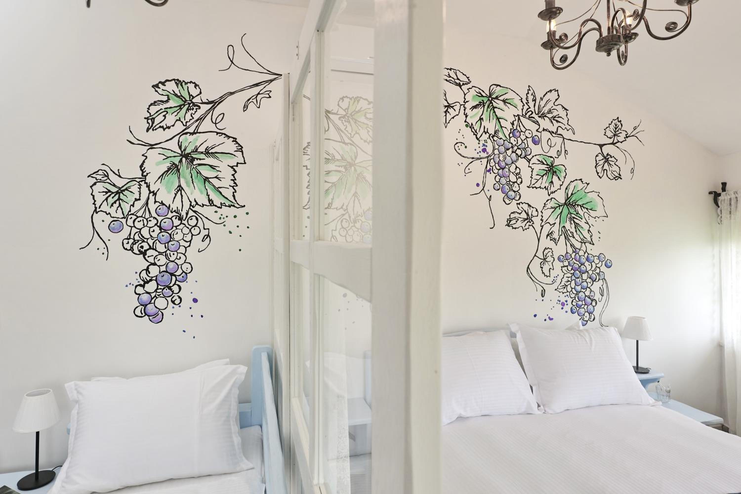 Deluxe Quadruple Room - Photo 19