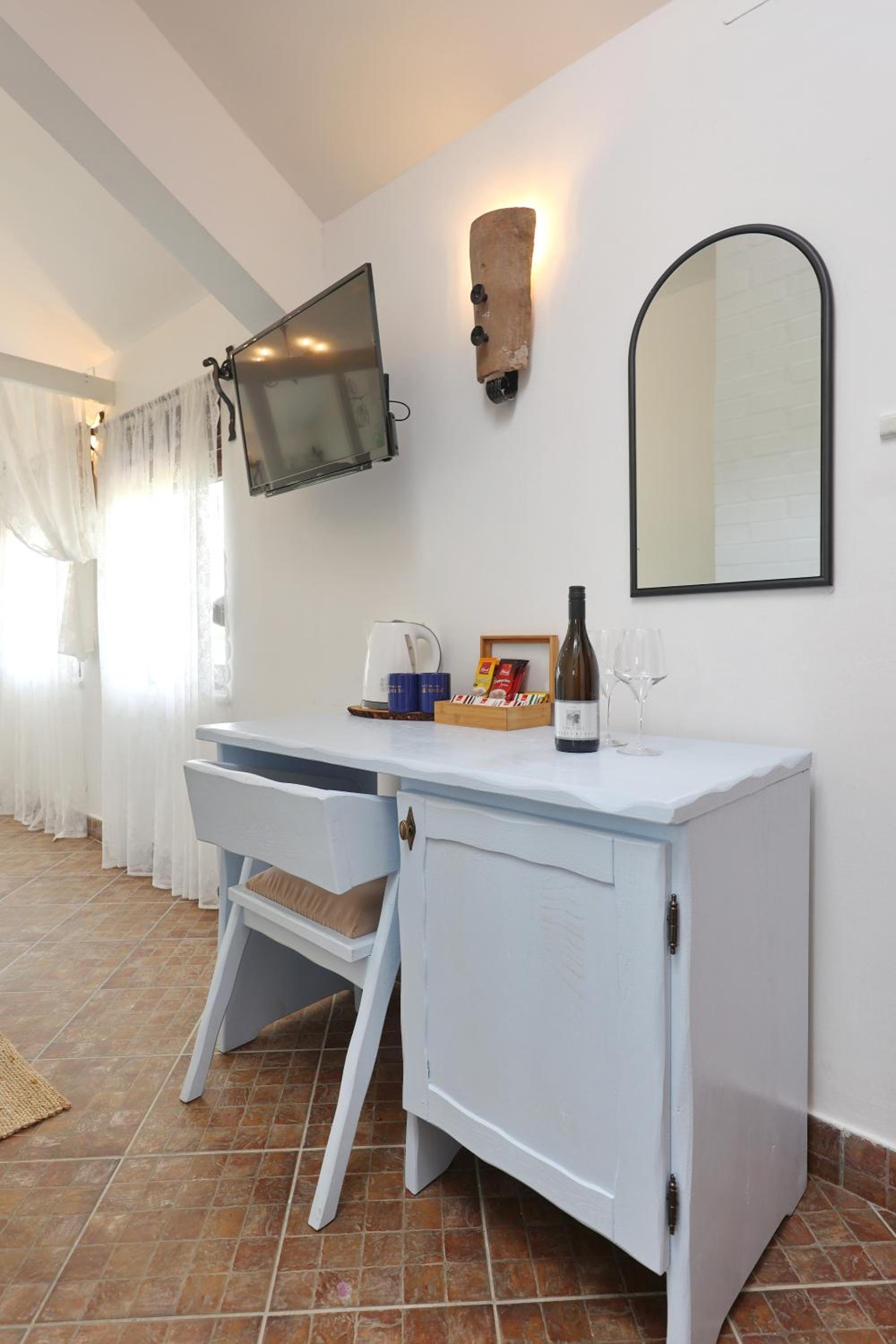 Deluxe Quadruple Room - Photo 24