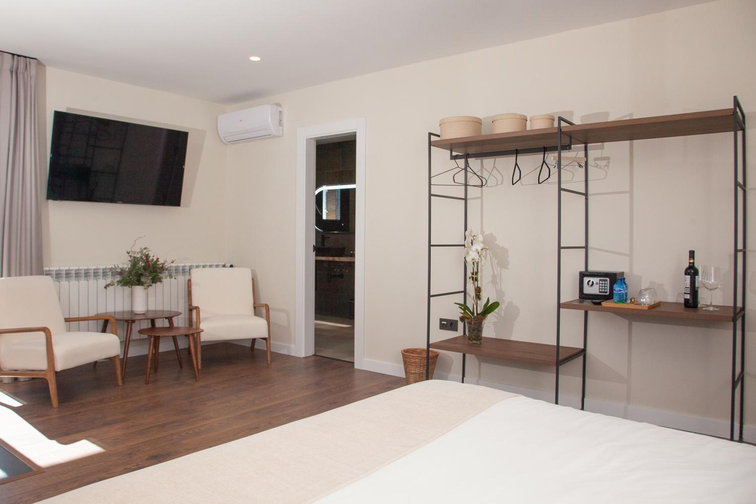 Suite Deluxe con Bañera de Hidromasaje Suite Deluxe con Bañera de Hidromasaje