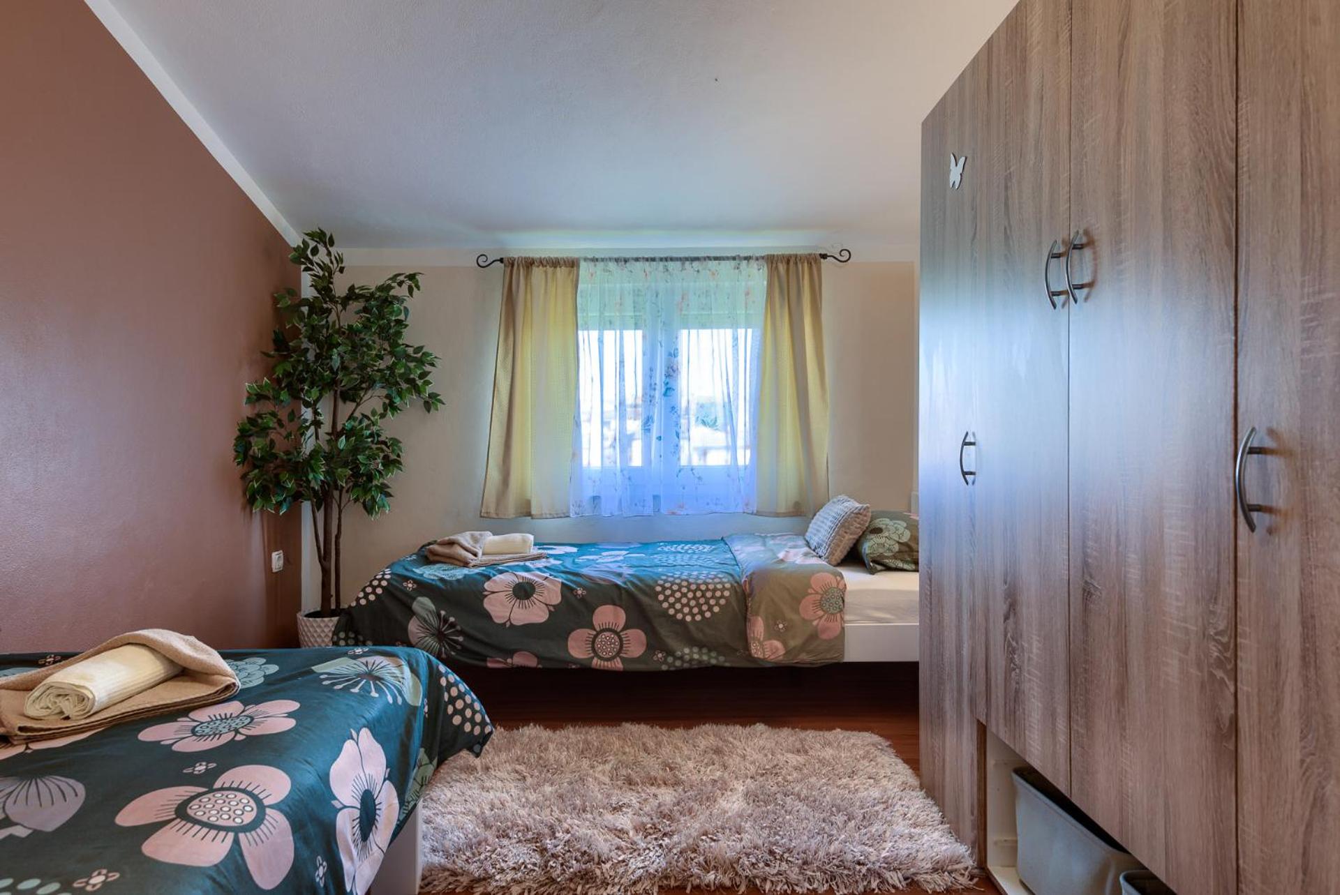 Three-Bedroom Apartment - Photo 28