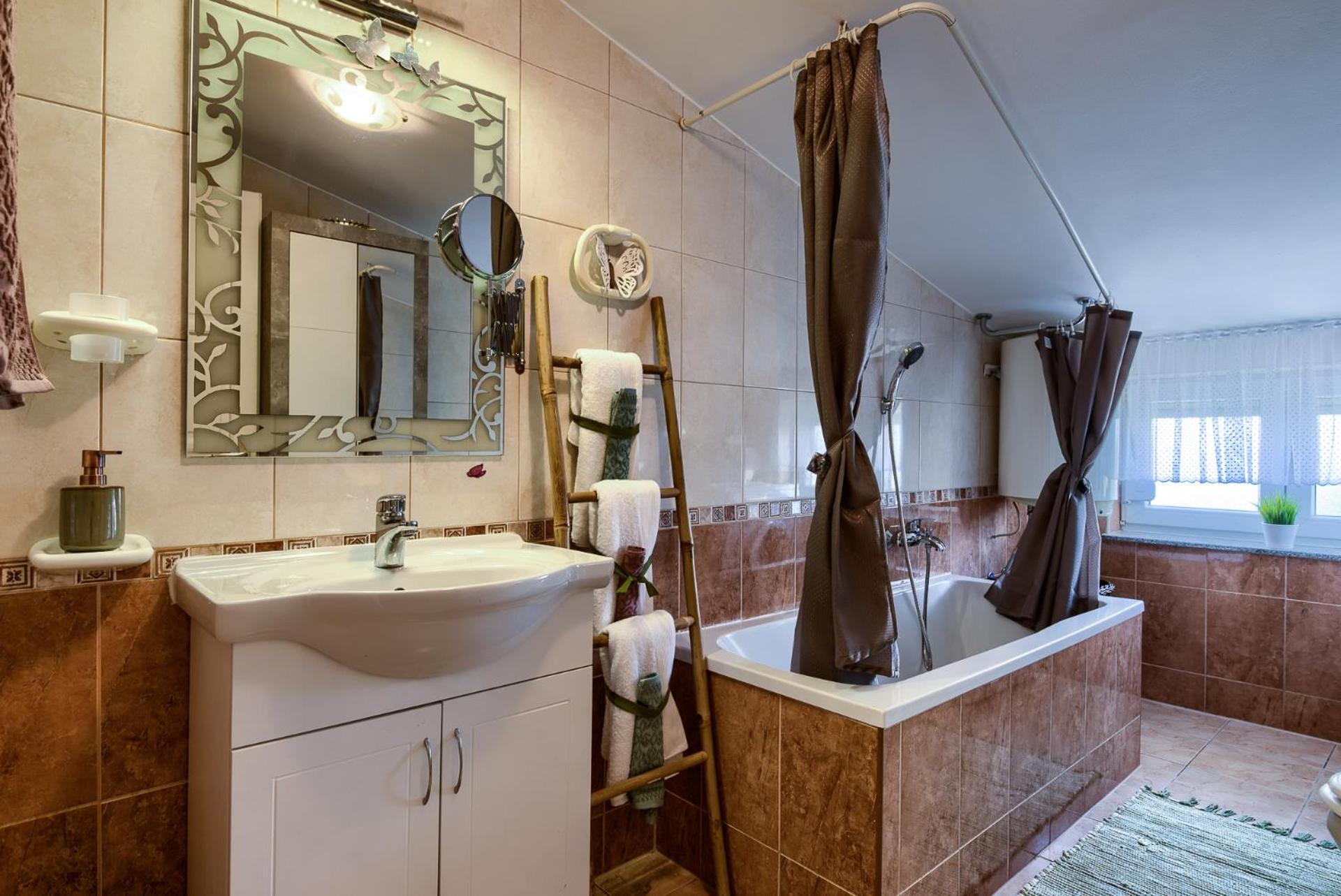 Three-Bedroom Apartment - Photo 18