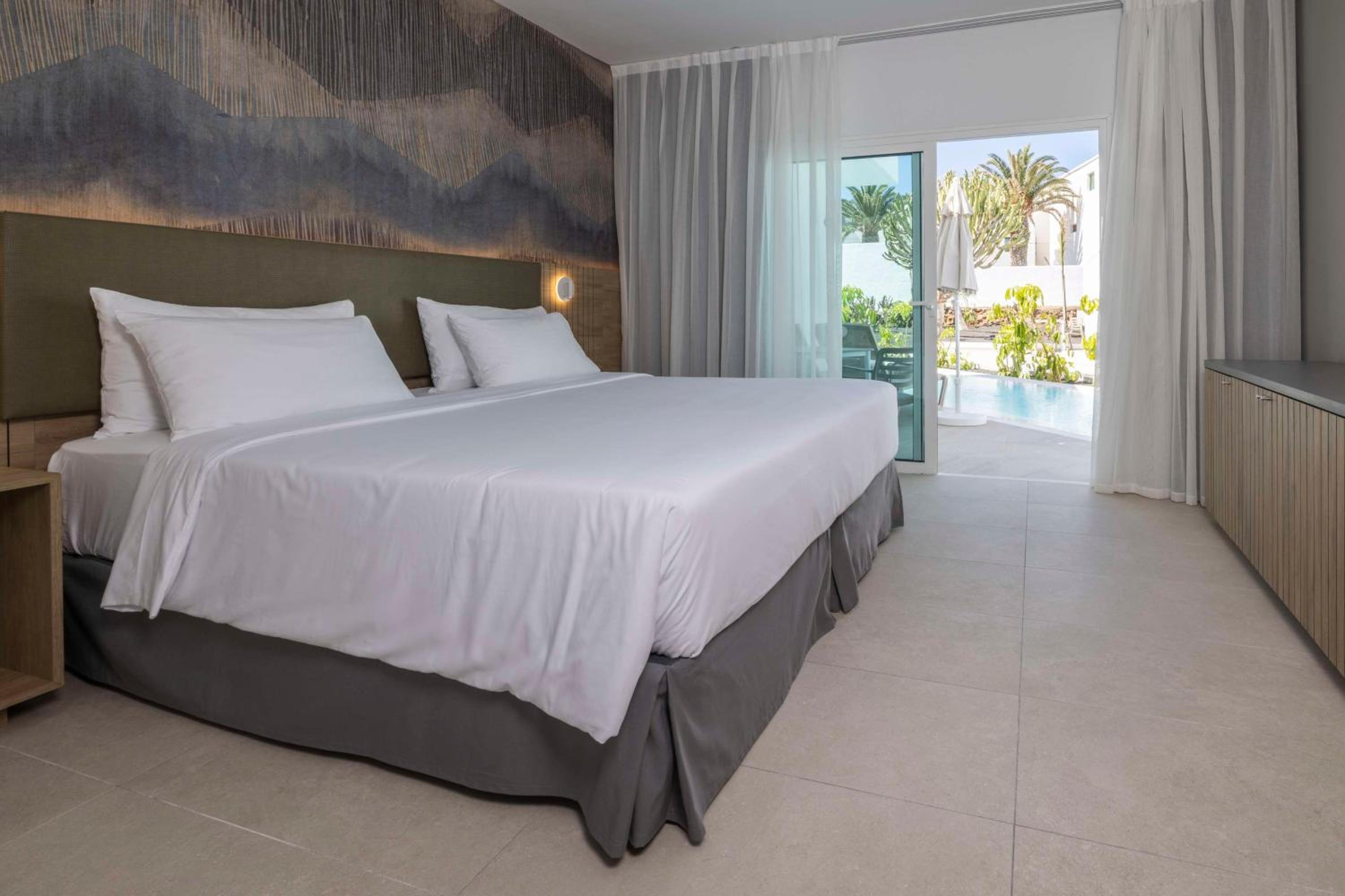 Suite - Acceso directo a la piscina