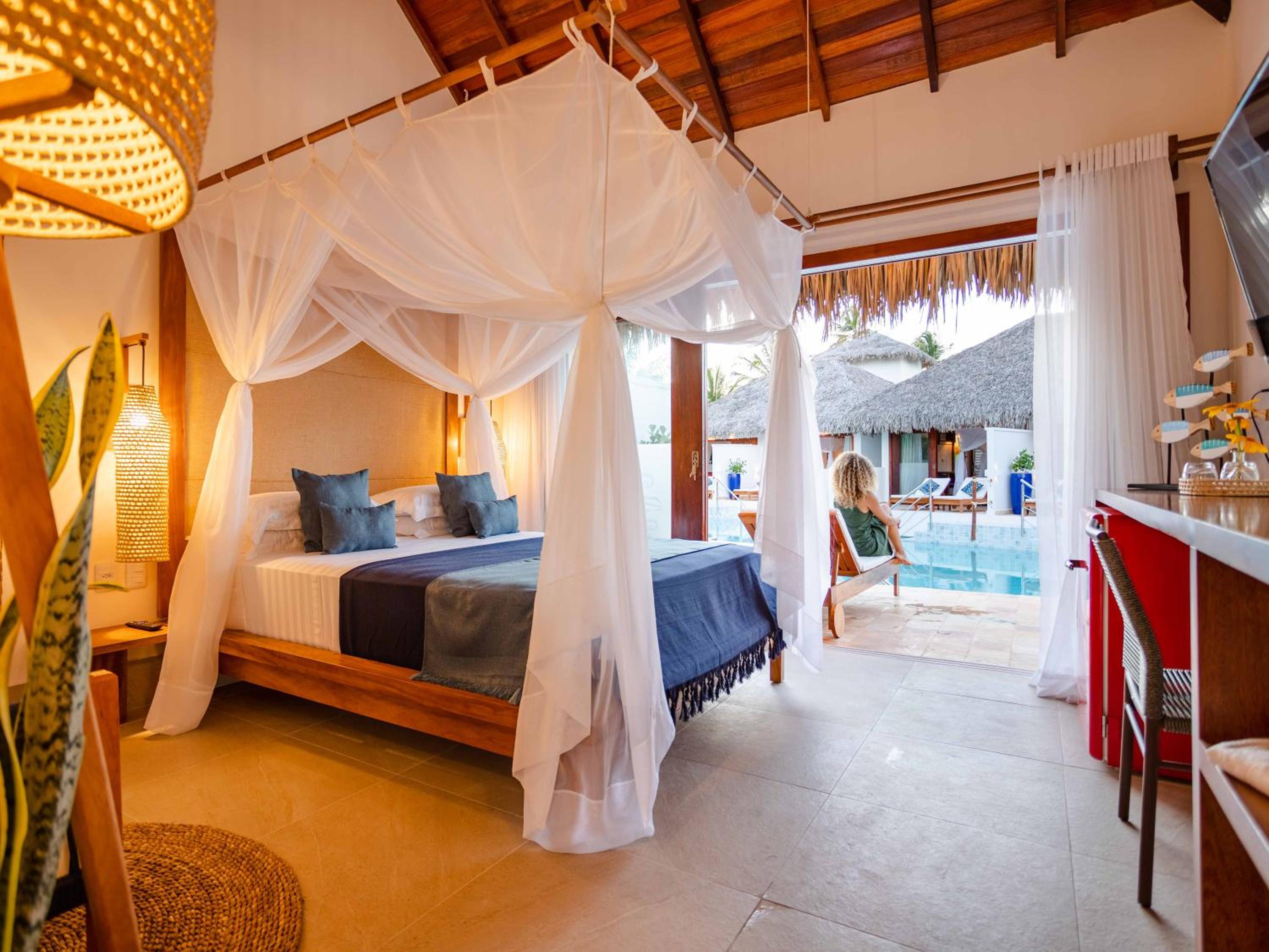 Suite com Cama Queen Size e Varanda