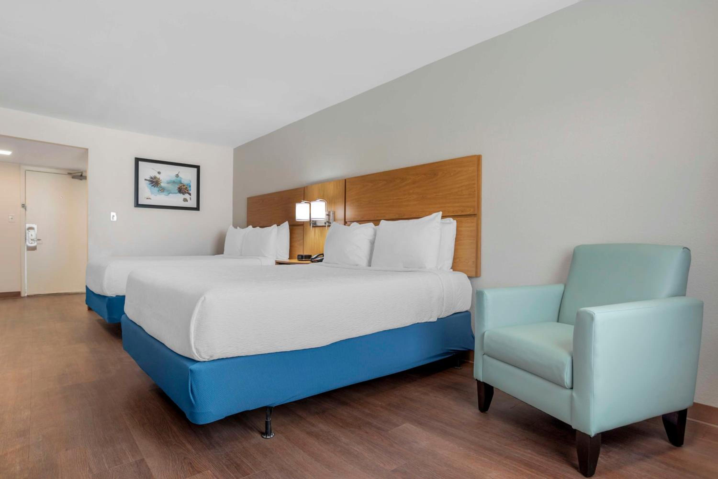 Two-Bedroom Queen Suite with Four Queen Beds and Sofa Bed - Non-Smoking