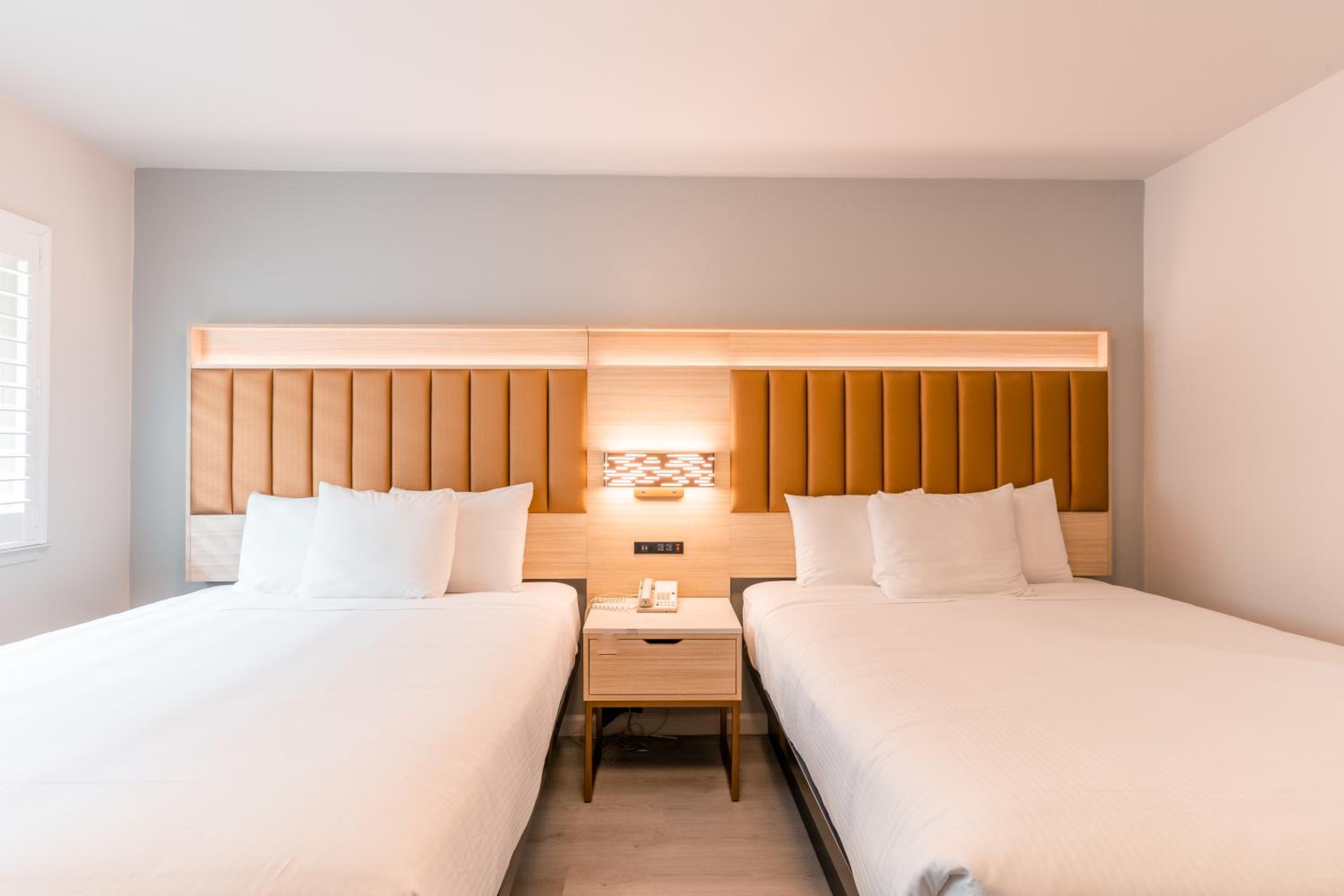 Queen Room with Two Queen Beds - Non-Smoking - Photo 1