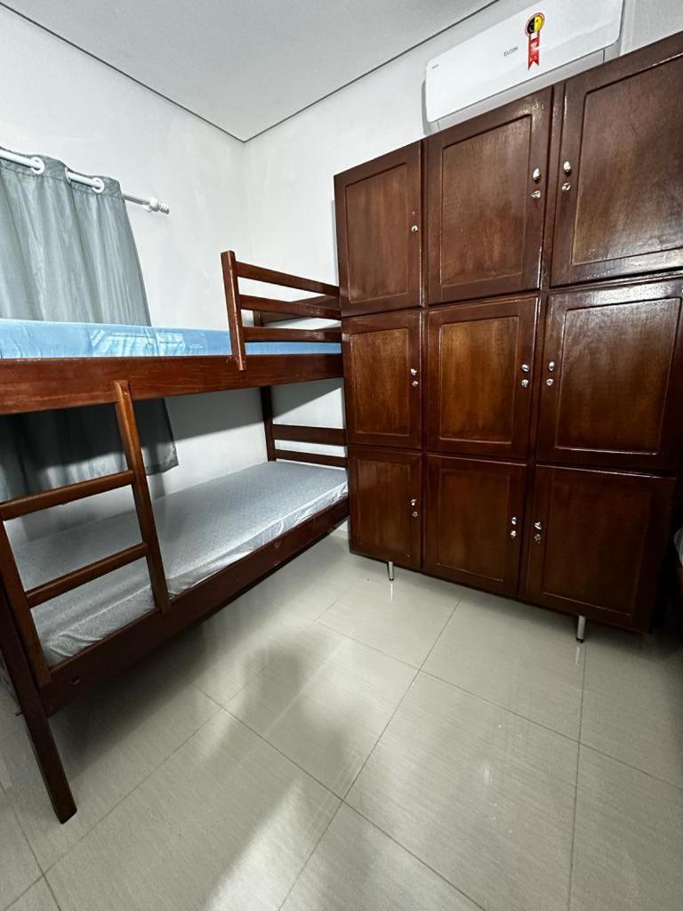 Single Bed In Male Dormitory Room