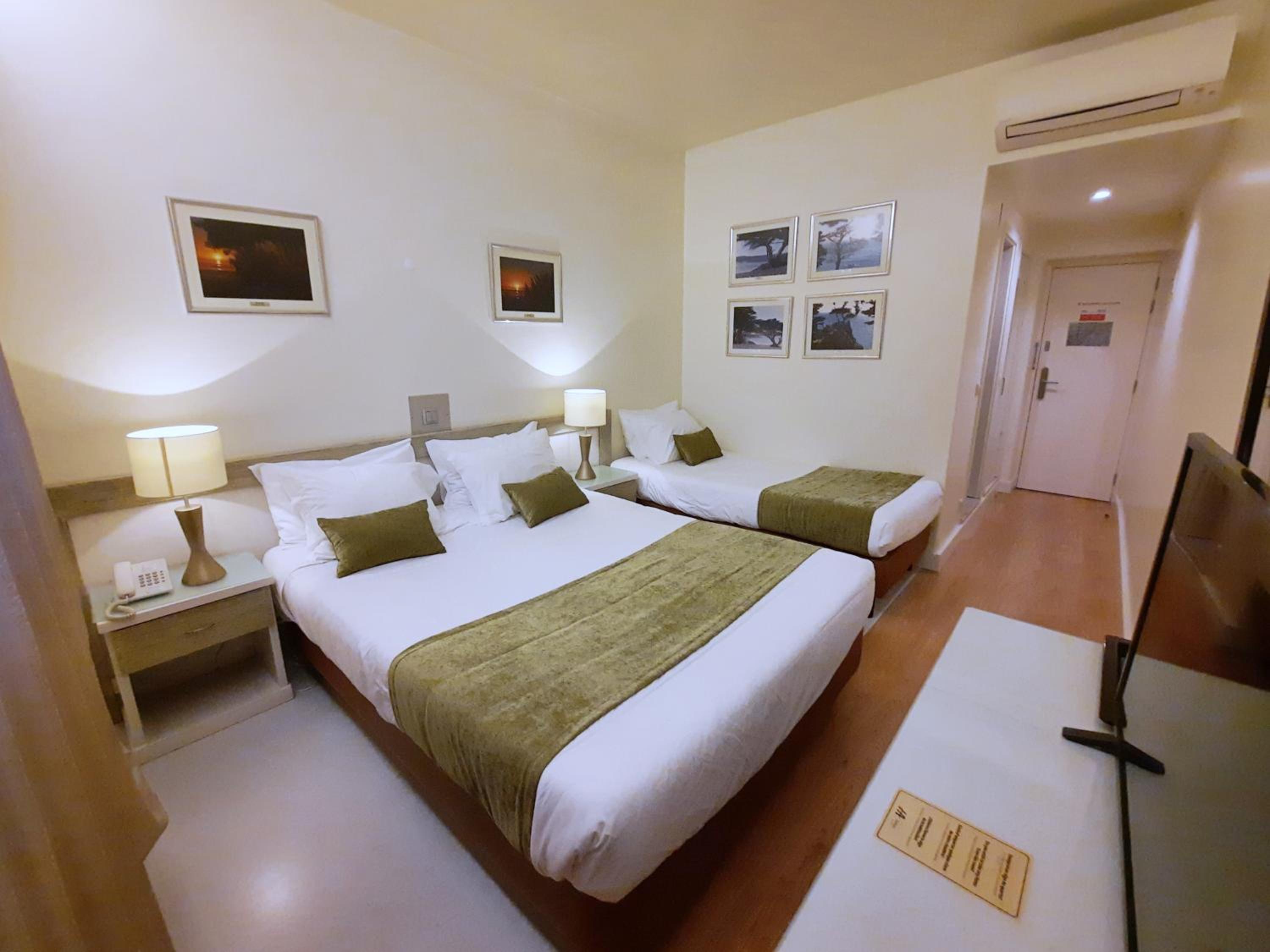 Room with One Double Bed and one Single Bed
