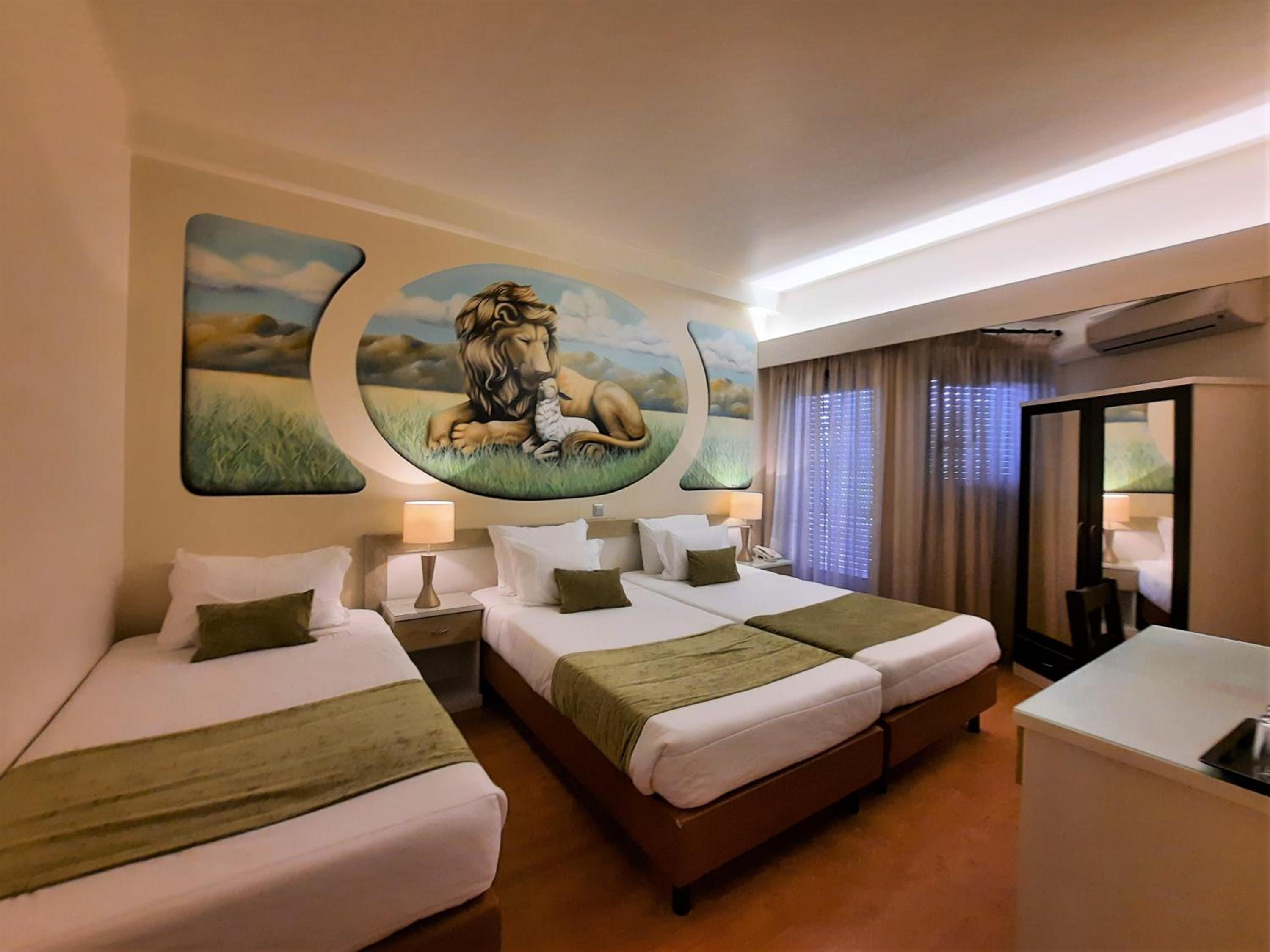 3 Single Beds with Balcony