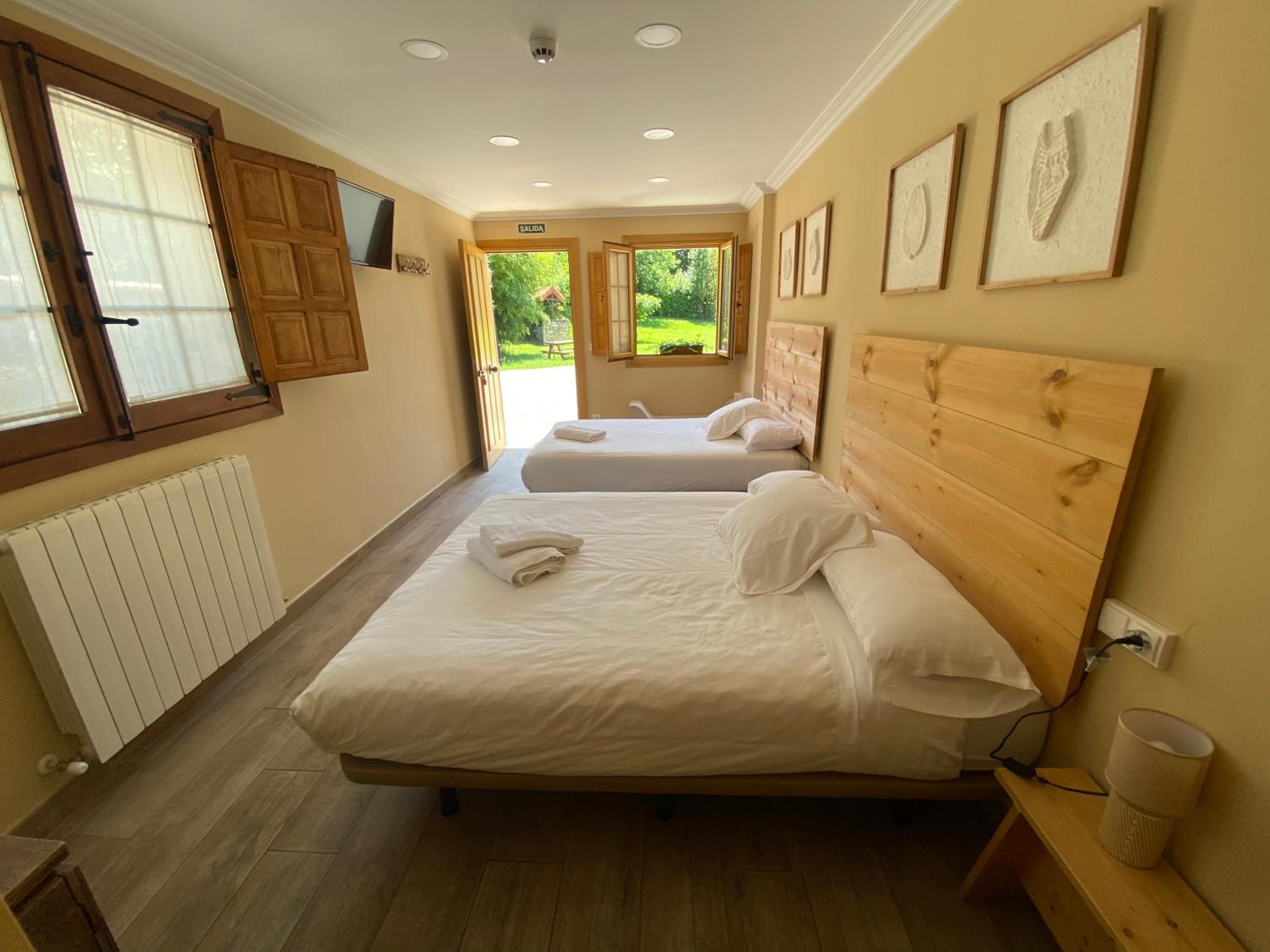 Deluxe Queen Room with Two Queen Beds - Photo 1