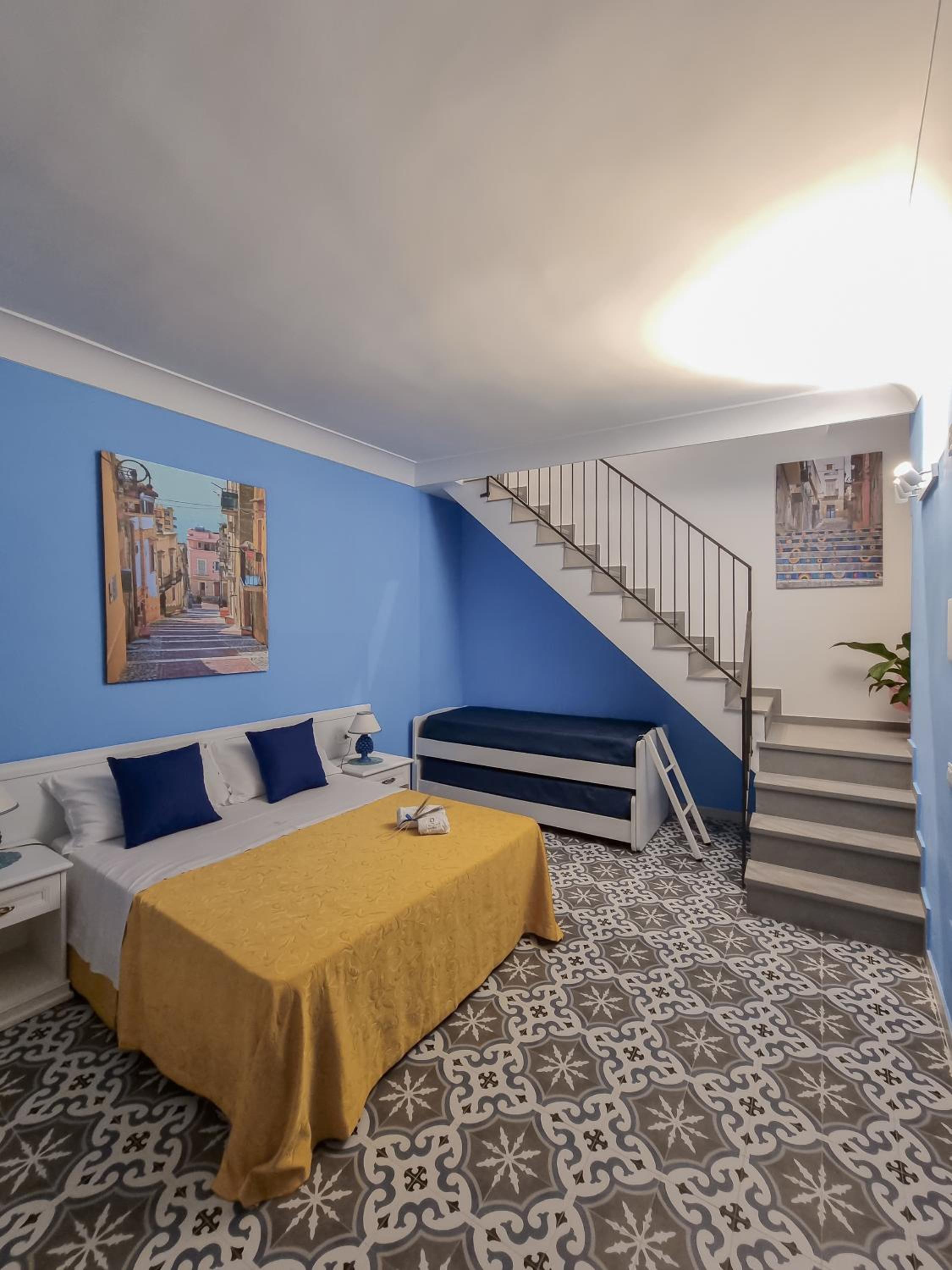 Quadruple Room with Private Bathroom
