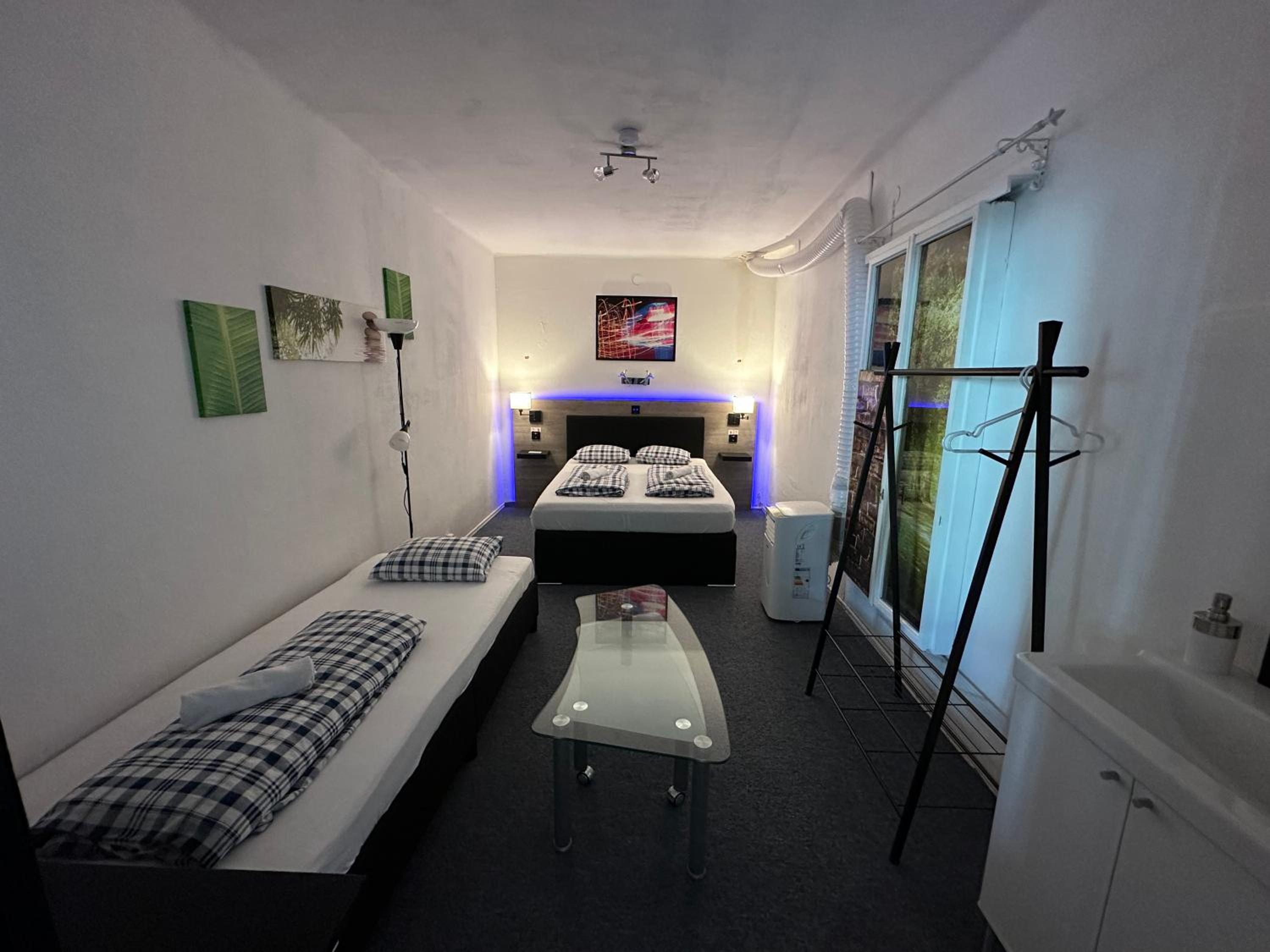 Economy Quadruple Room with Shared Bathroom
