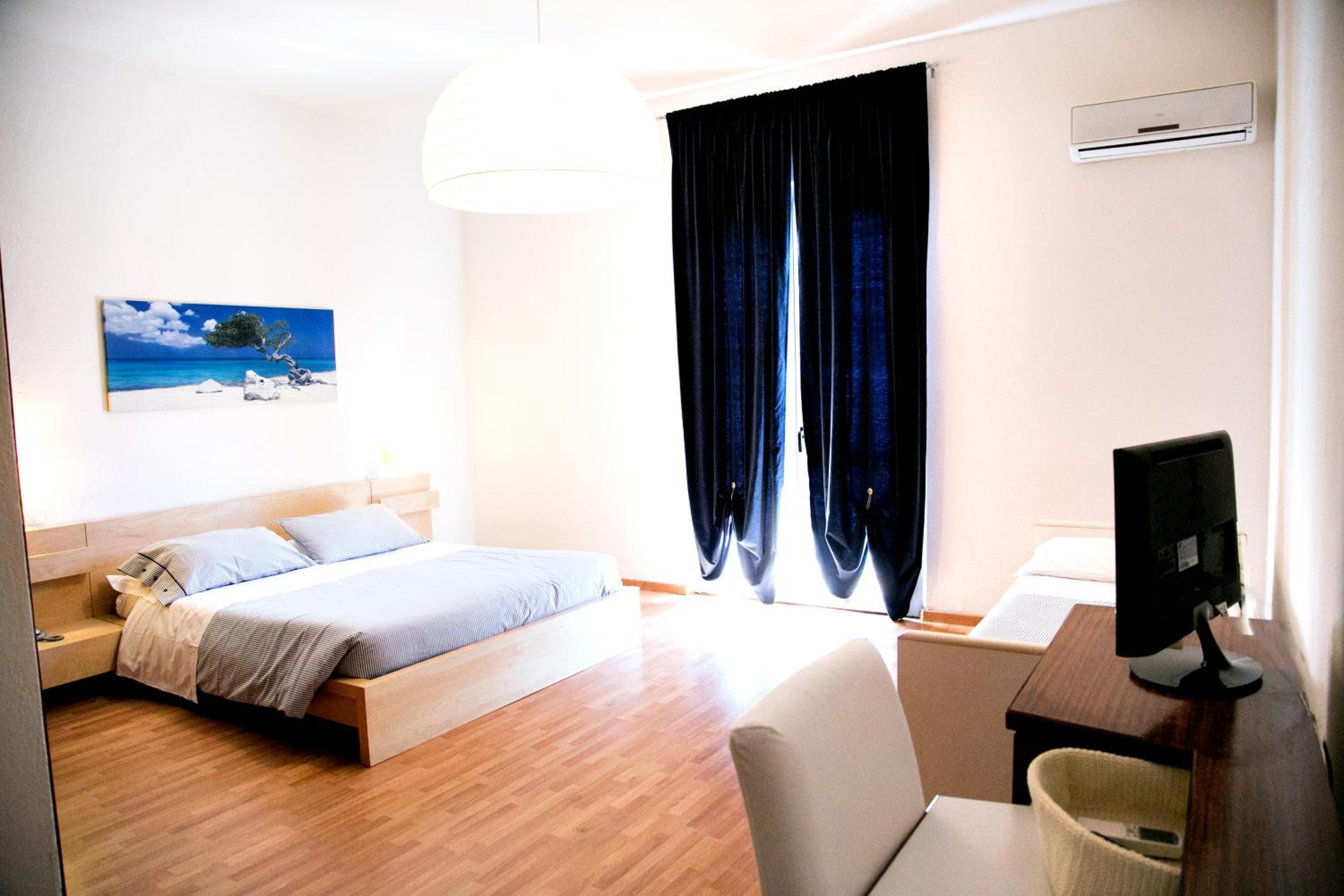 Quadruple Room with Balcony photo 3
